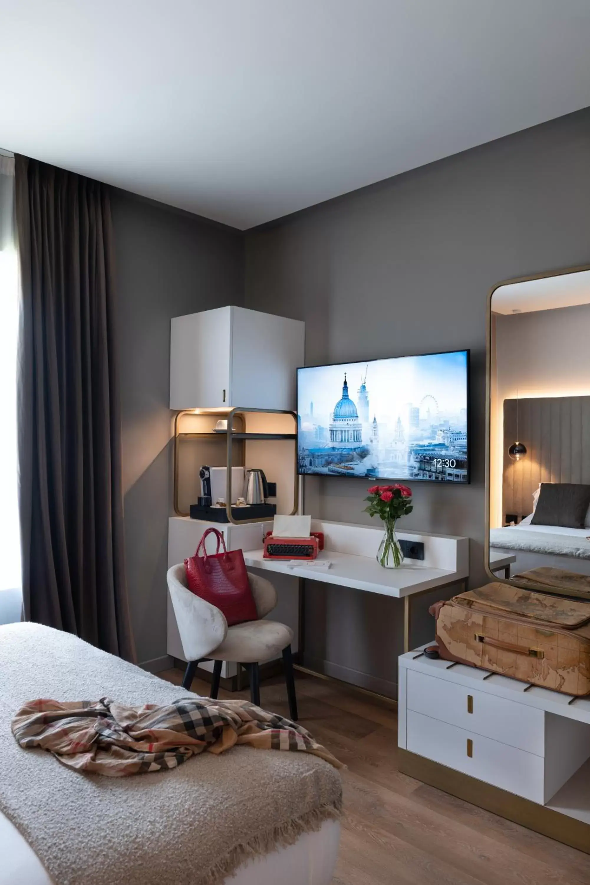 TV and multimedia, TV/Entertainment Center in 3T Boutique Hotel