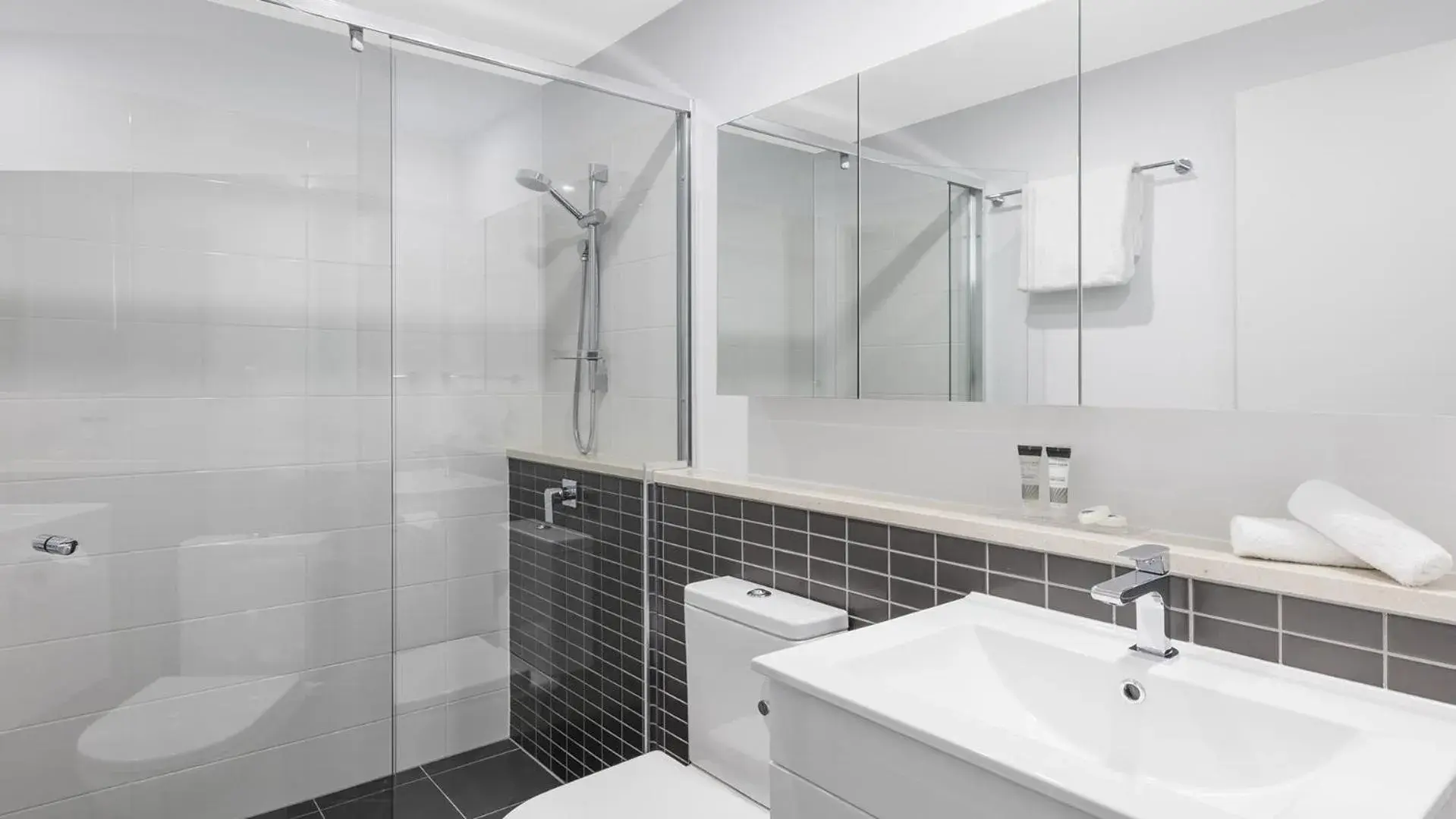 Shower, Bathroom in Oaks Brisbane Woolloongabba Suites