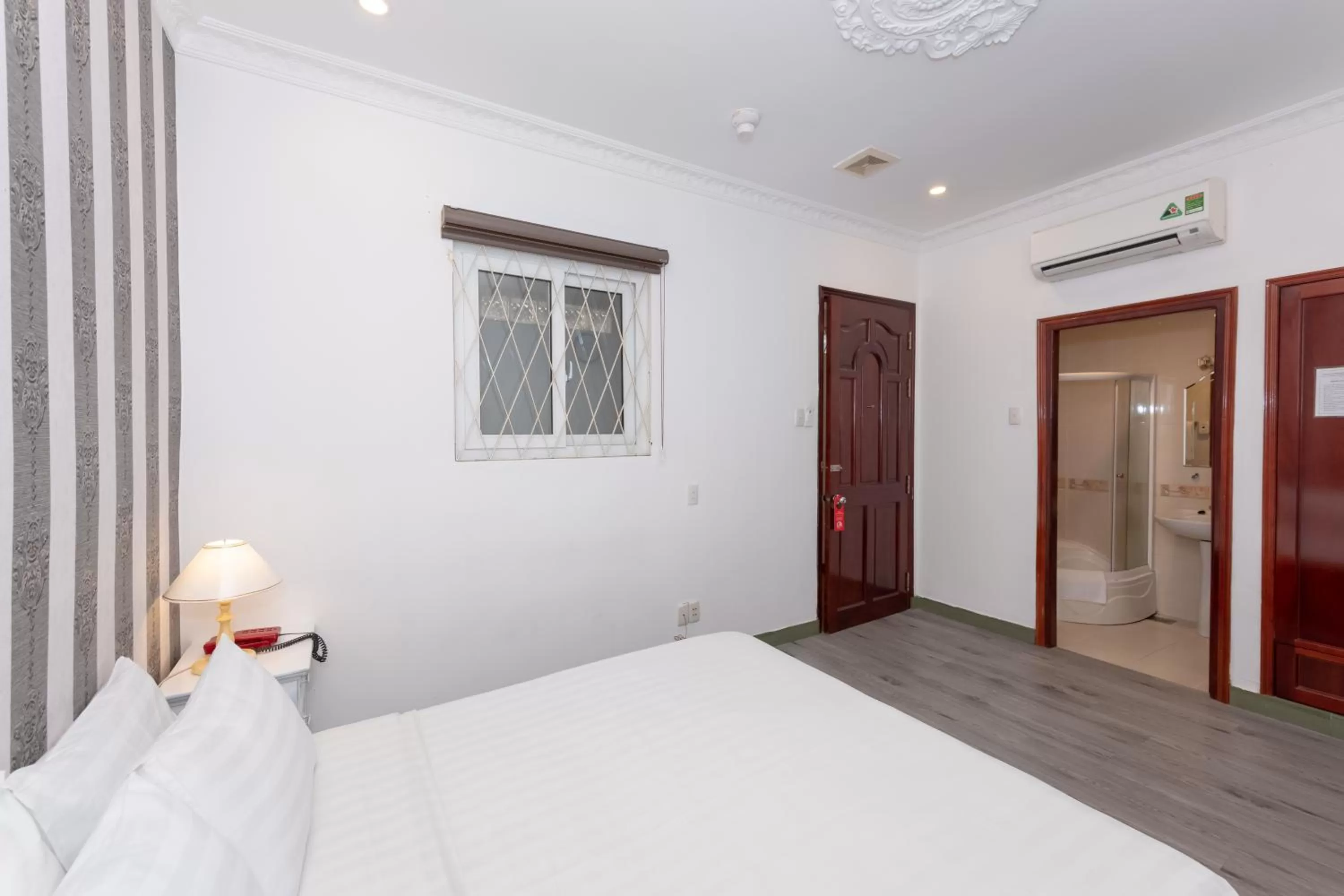 Photo of the whole room, Bed in Ben Thanh Station Hotel