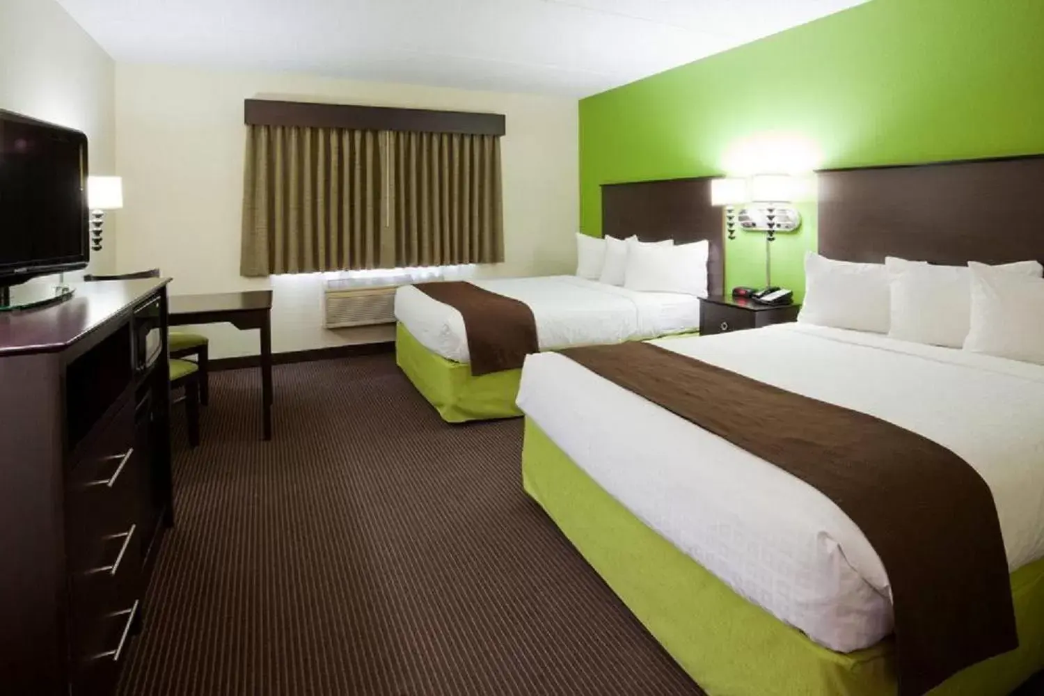 Photo of the whole room, Bed in AmericInn by Wyndham Black River Falls I-94 on ATV Trail