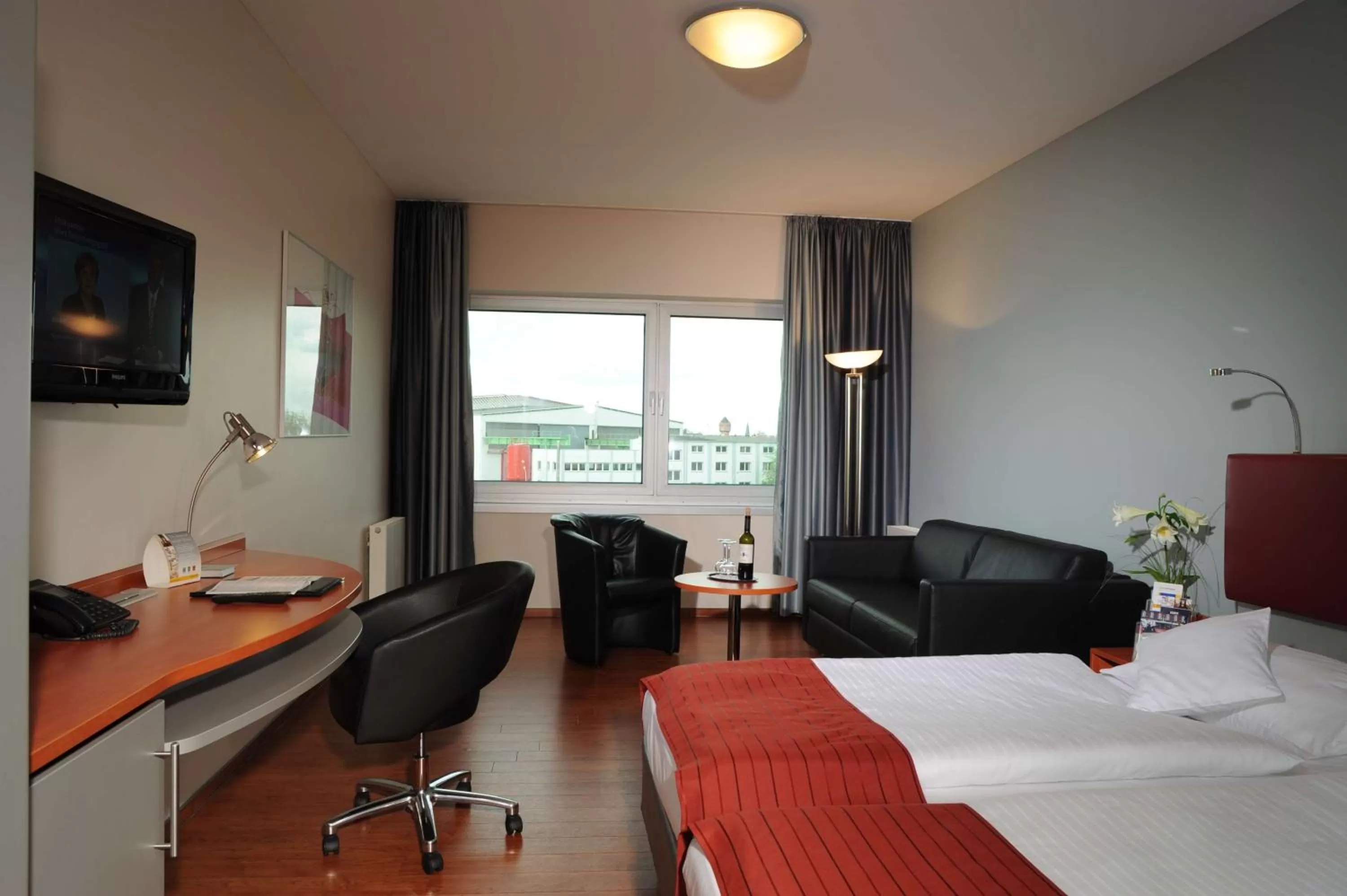 Photo of the whole room, Bed in Nordsee Hotel Fischereihafen