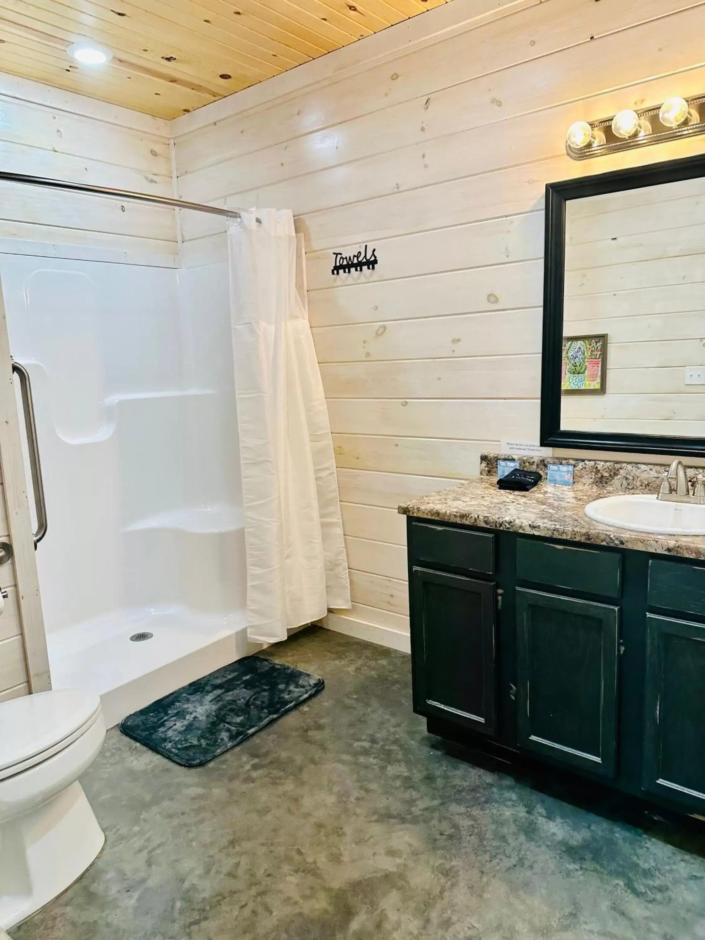 Shower, Bathroom in Knotty Squirrel Cabins