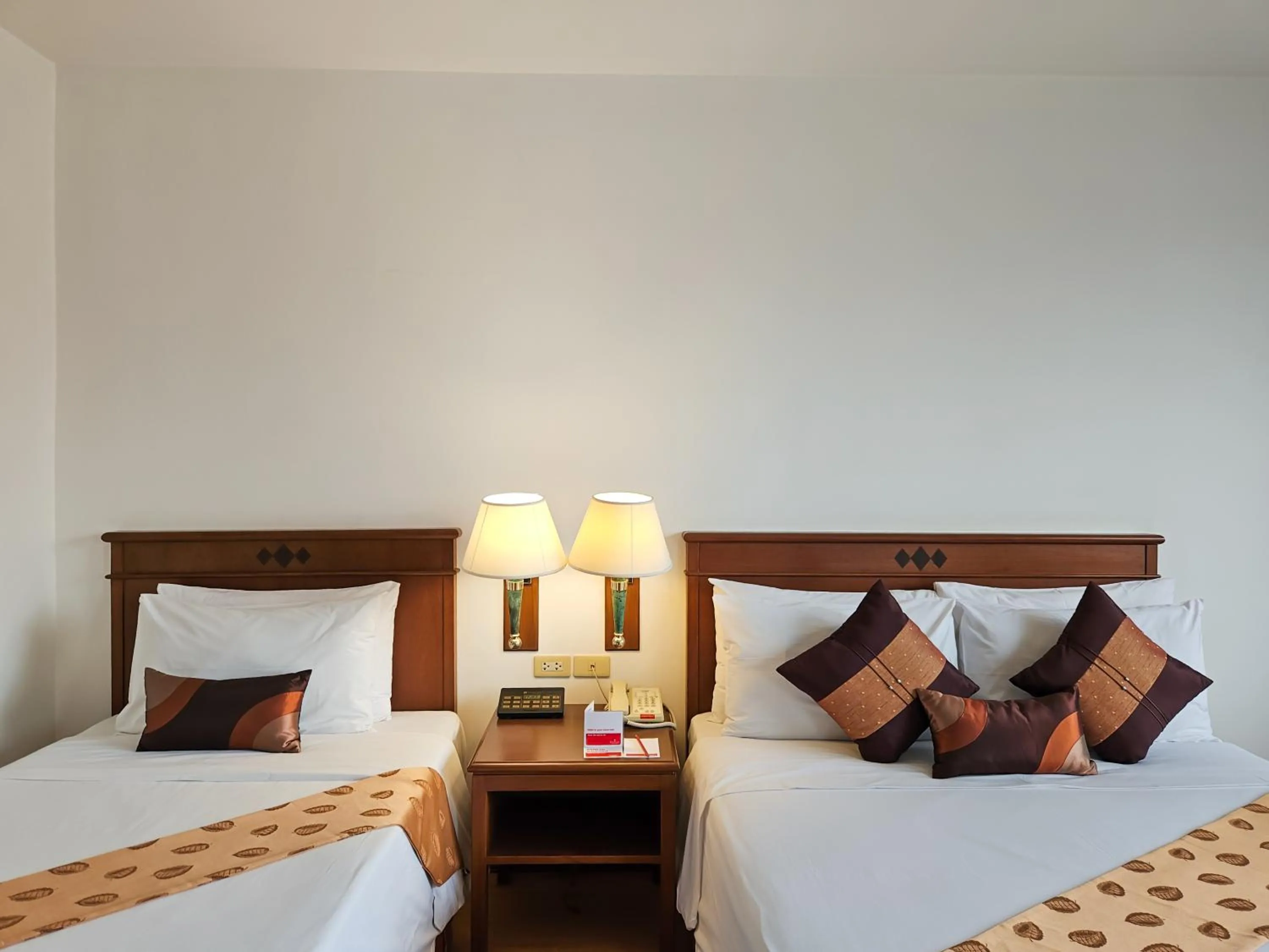 Bed in Ramada by Wyndham D MA Bangkok