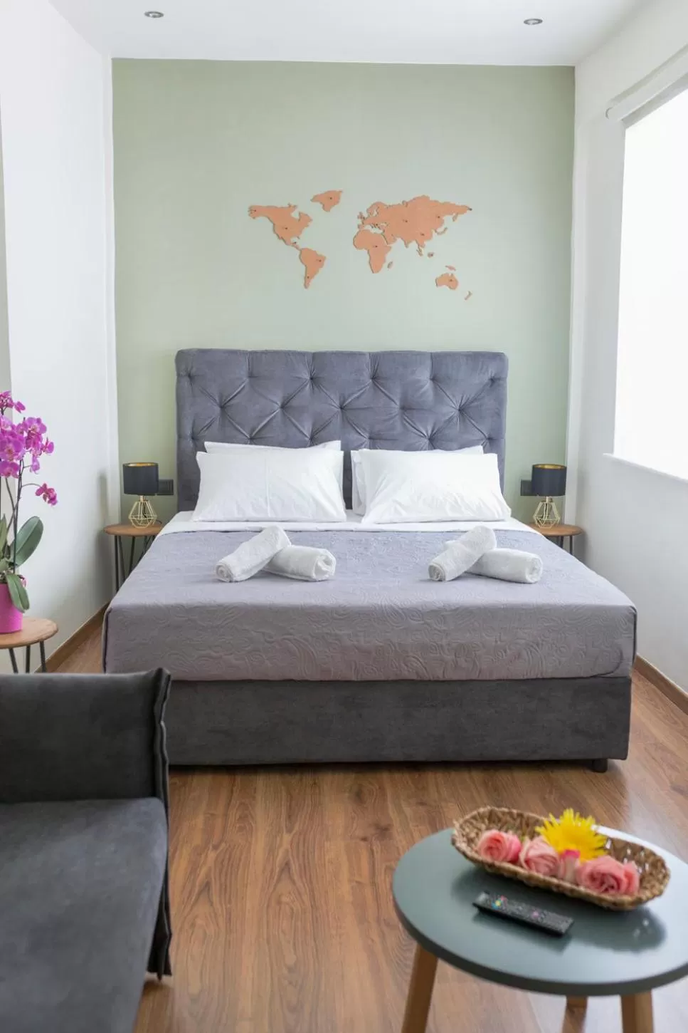 Living room, Bed in The Athens Version Luxury Suites