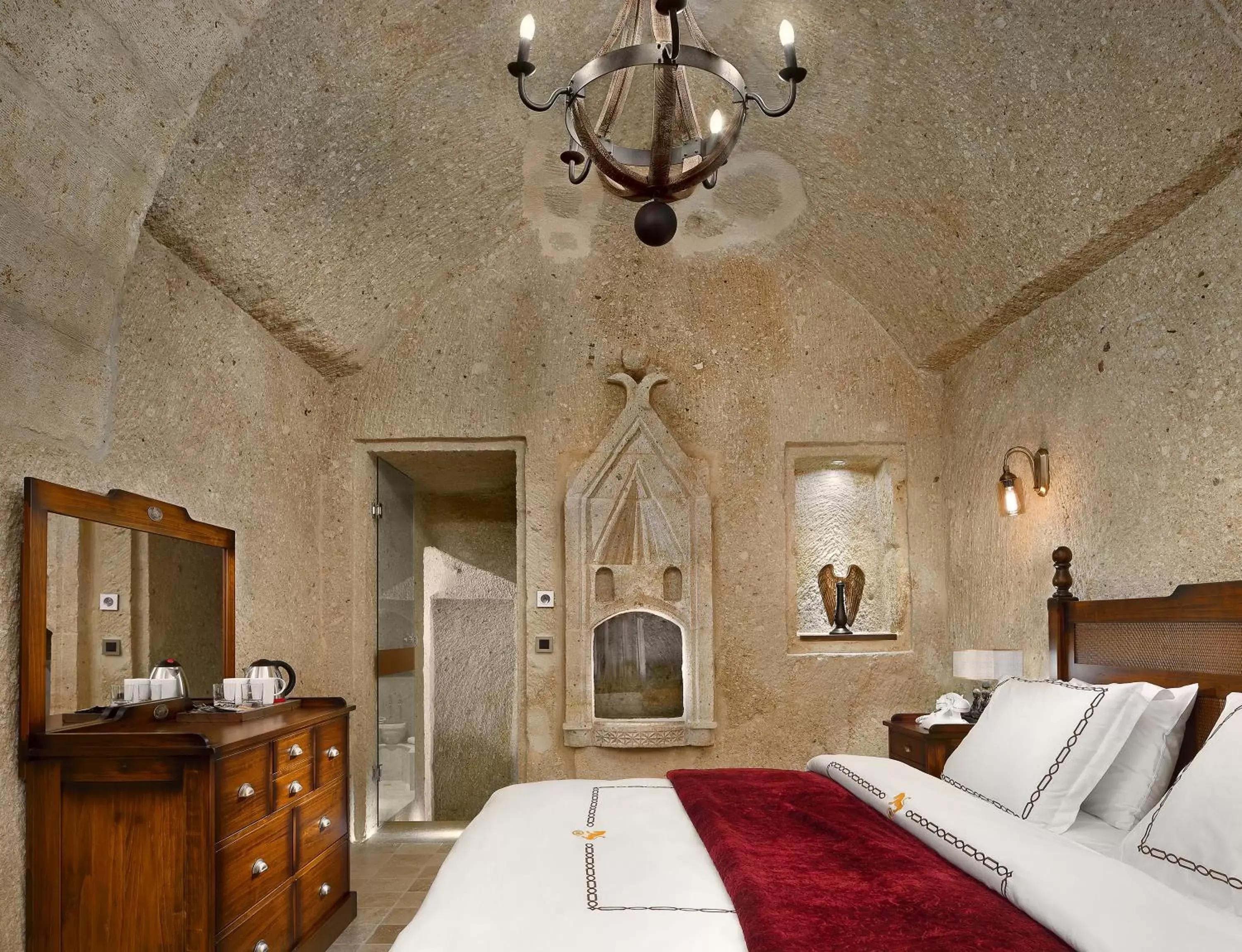 Bed in Seraphim Cave Suites & SPA