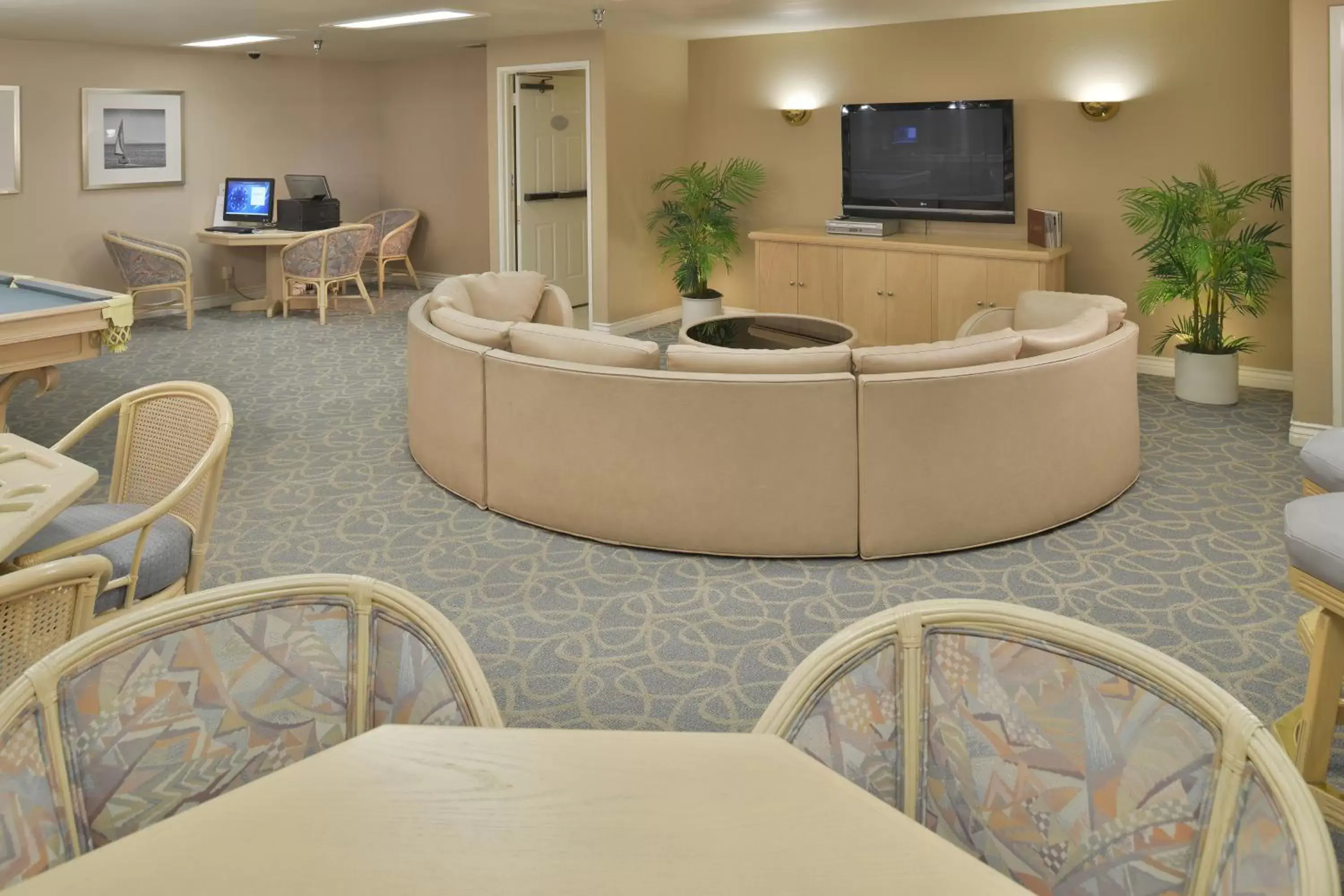 Communal lounge/ TV room in Riviera Beach & Shores Resorts