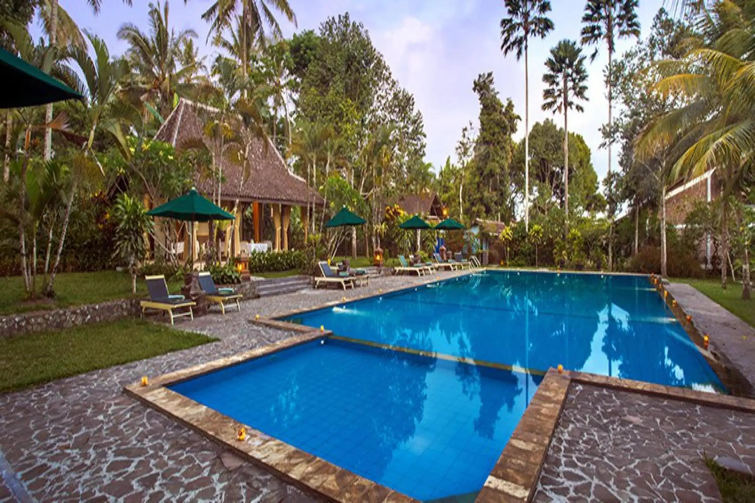 Swimming Pool in Margo Utomo Eco Resort by Tripletree