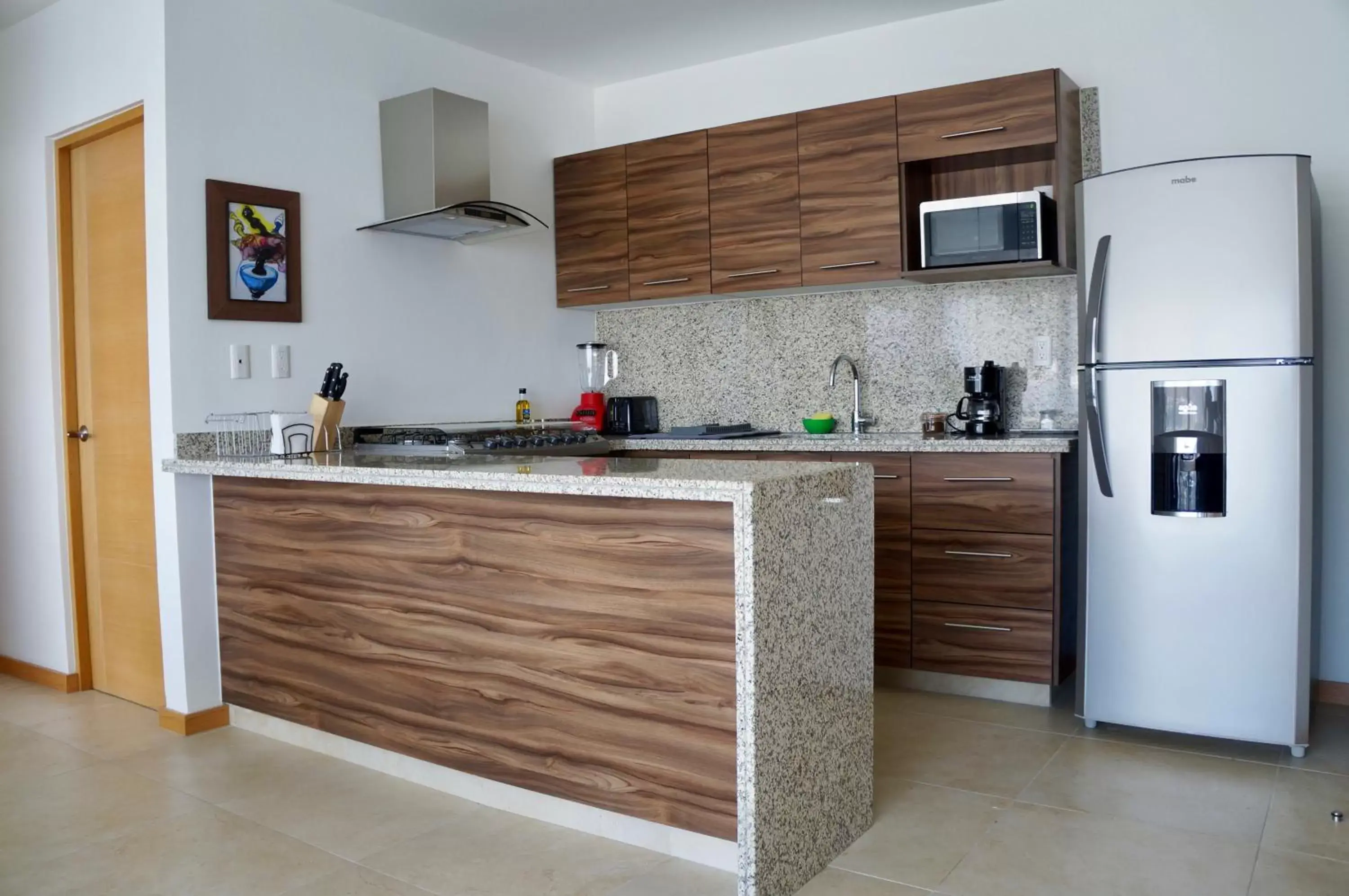 Kitchen/Kitchenette in Metropolitan Suites