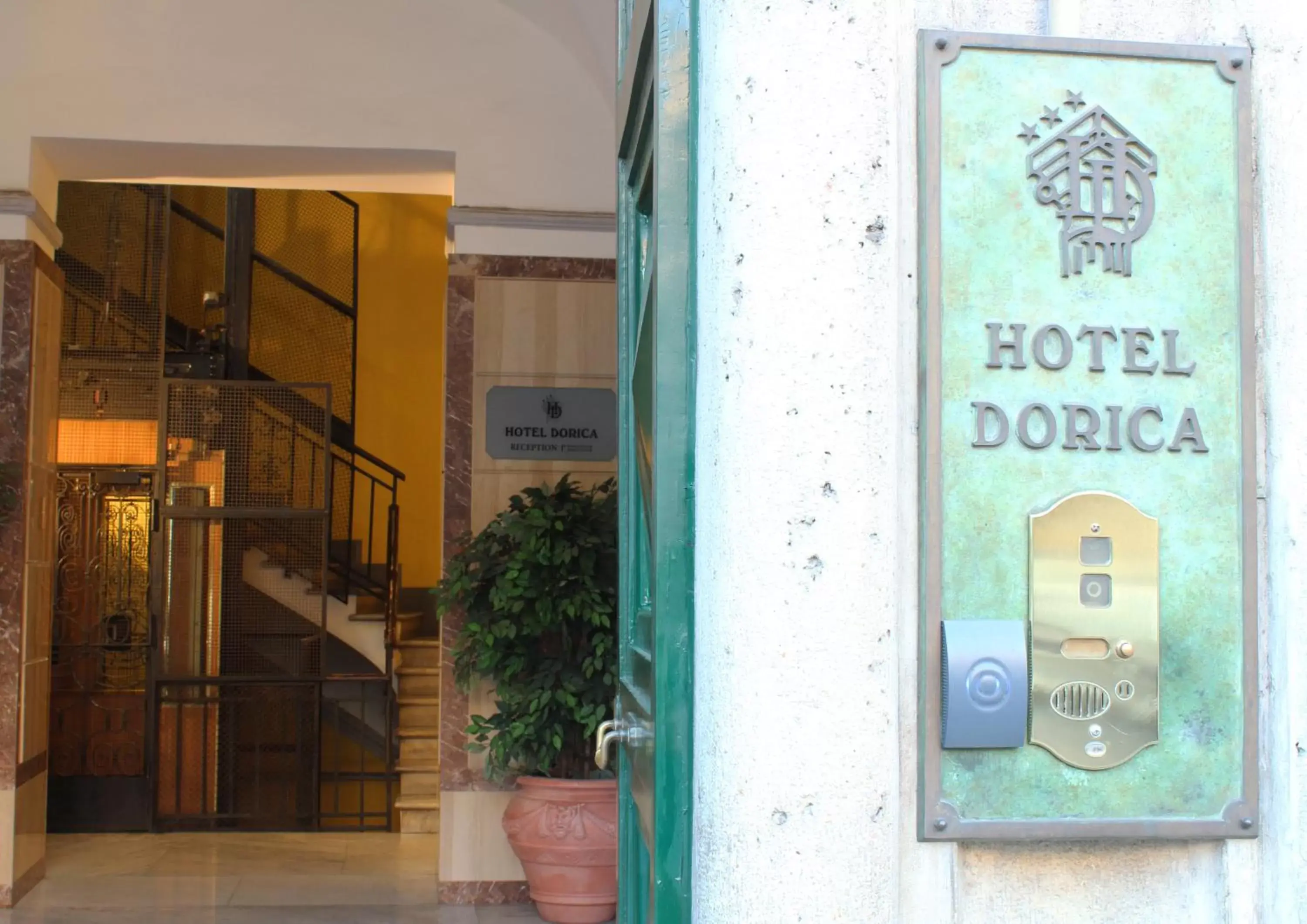 Property logo or sign in Hotel Dorica