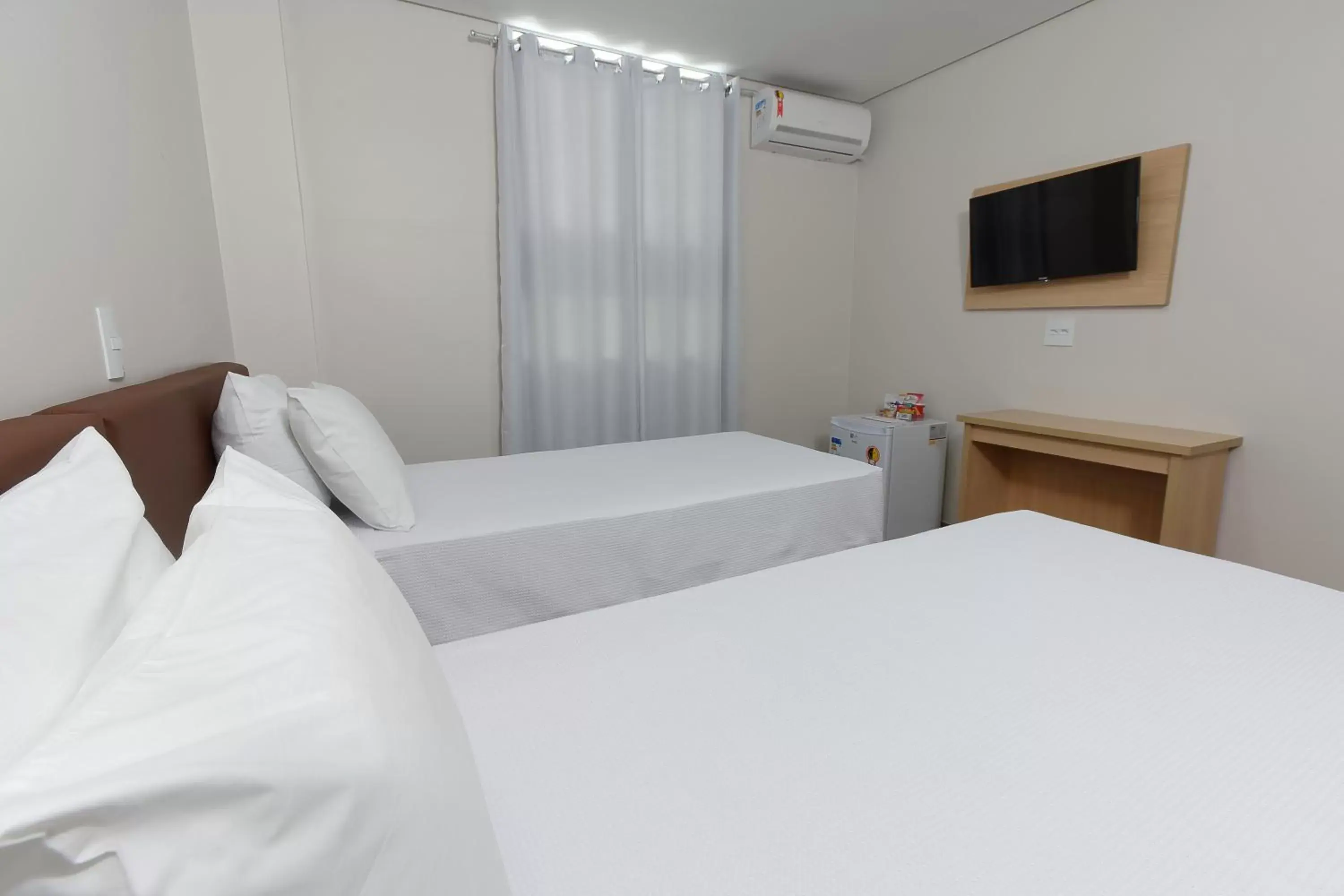 Bed in Fênix Hotel Moema