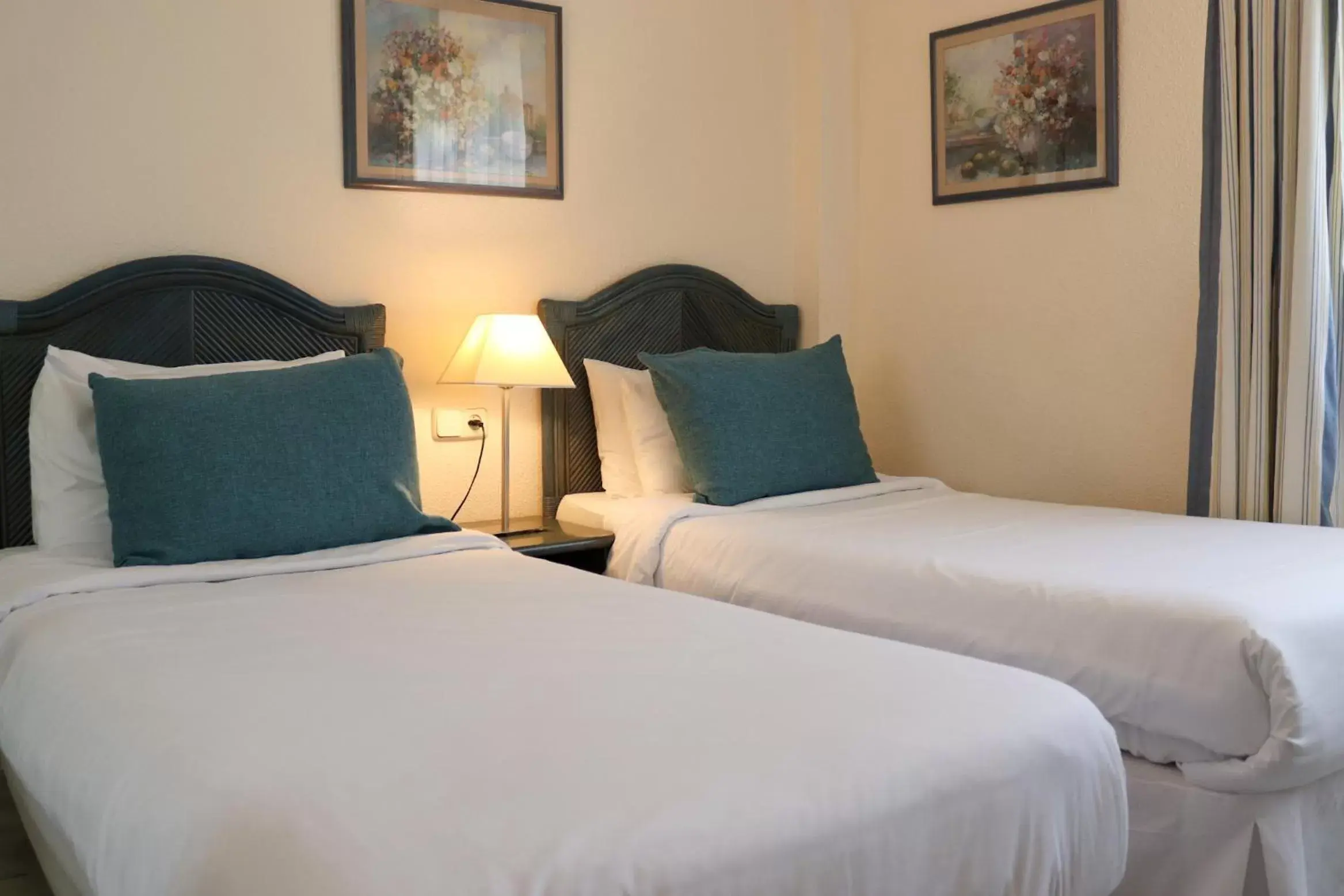 Bedroom, Bed in Ramada Hotel & Suites by Wyndham Costa del Sol