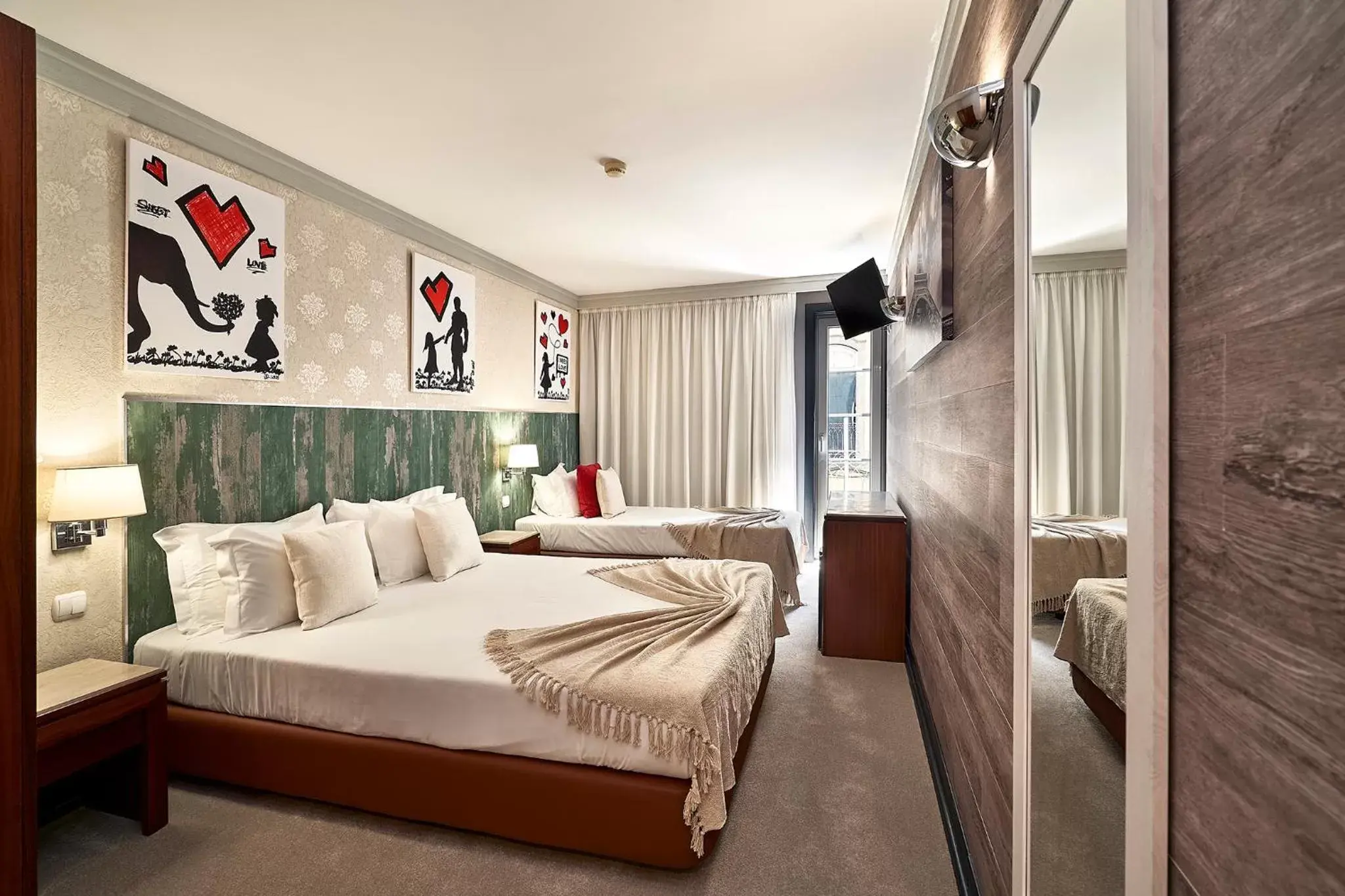 Bed in Galeria Suite Hotel