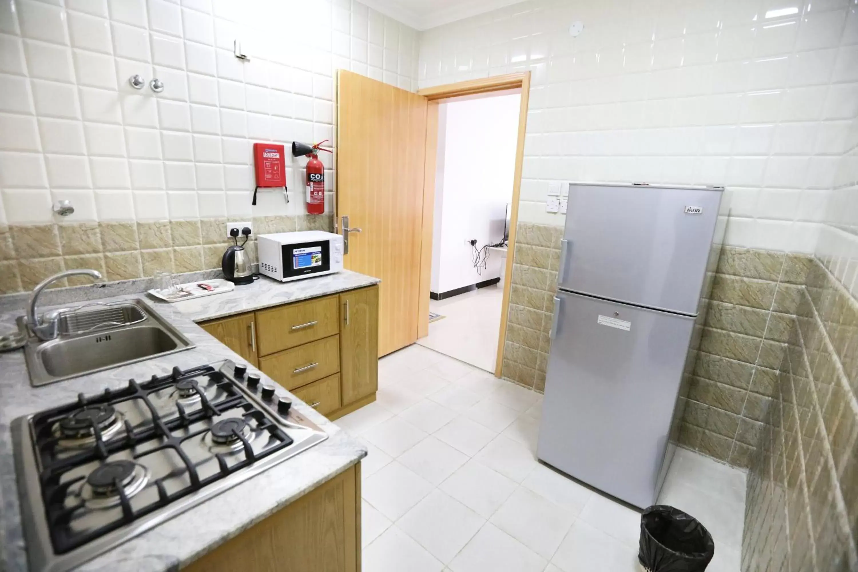 Kitchen or kitchenette in Al Rayyan Hotel Apartments Muscat Kitchen or kitchenette in Al Rayyan Hotel Apartments Muscat