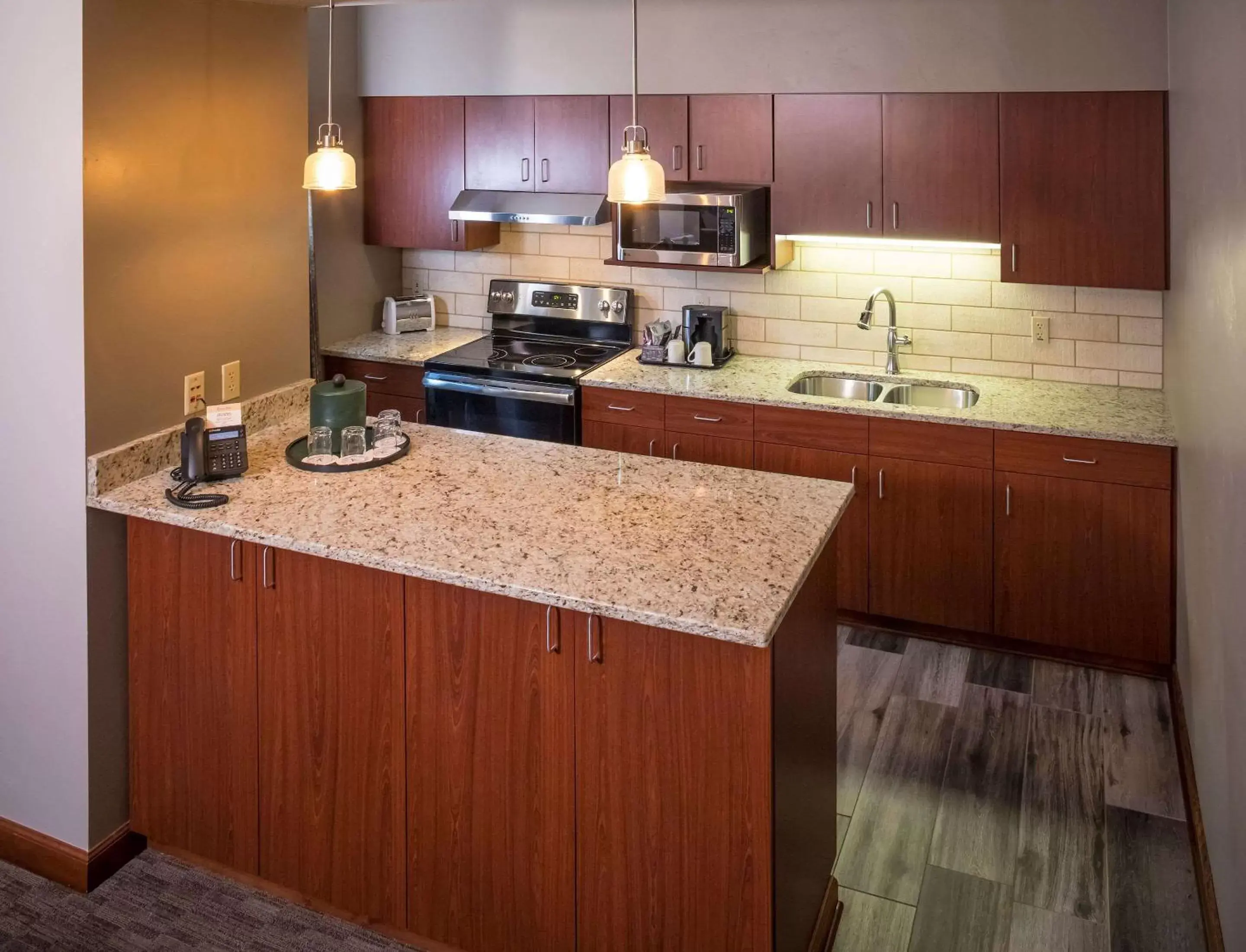 Photo of the whole room, Kitchen/Kitchenette in Kress Inn, Ascend Hotel Collection