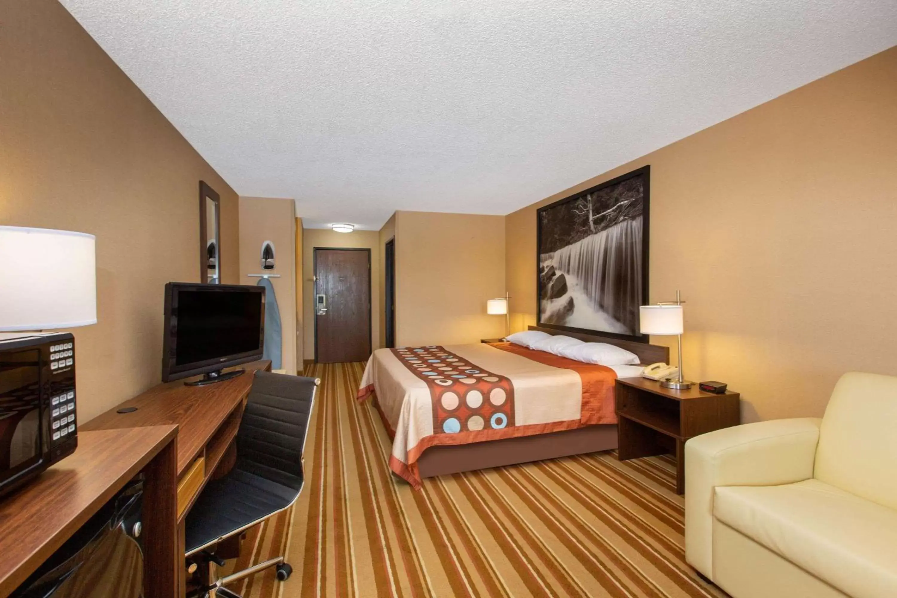 Photo of the whole room, TV/Entertainment Center in Super 8 by Wyndham Salina I-70
