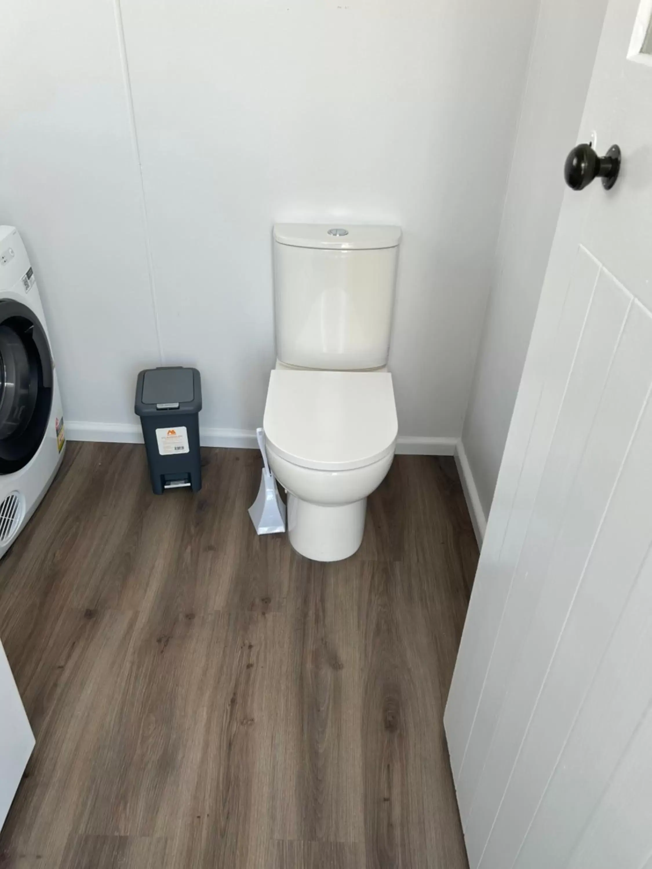 Toilet, Bathroom in Waterfront Lodge Motel