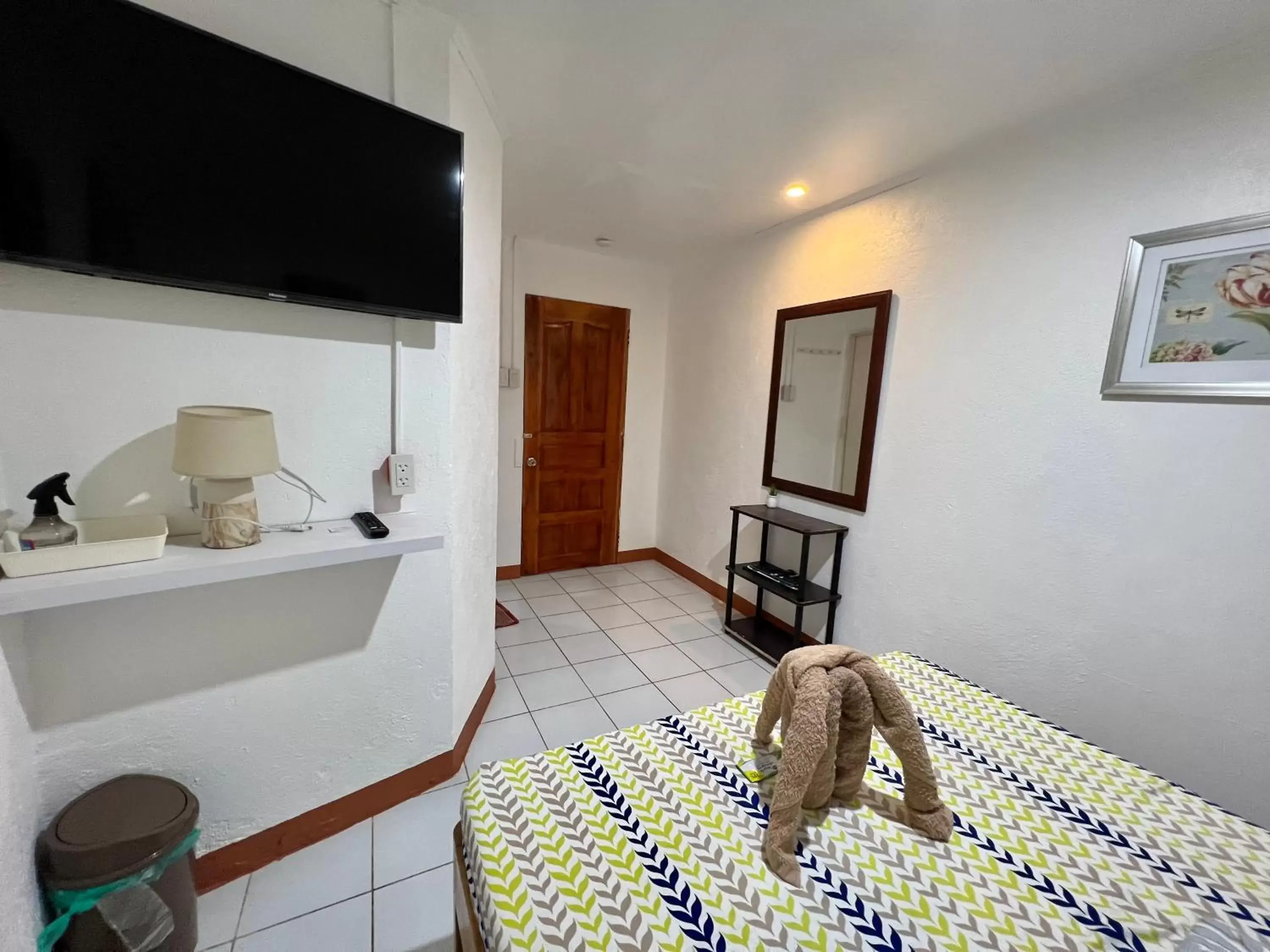 Bedroom, TV/Entertainment Center in West Coast Beach House