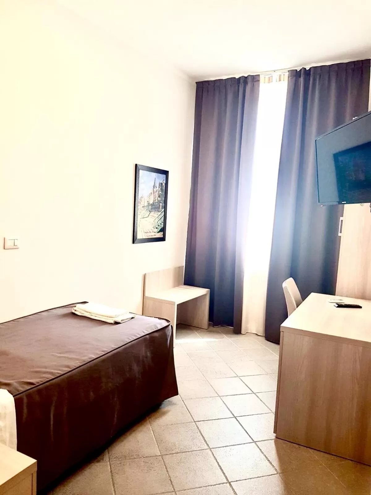 Bed in Academy Hotel