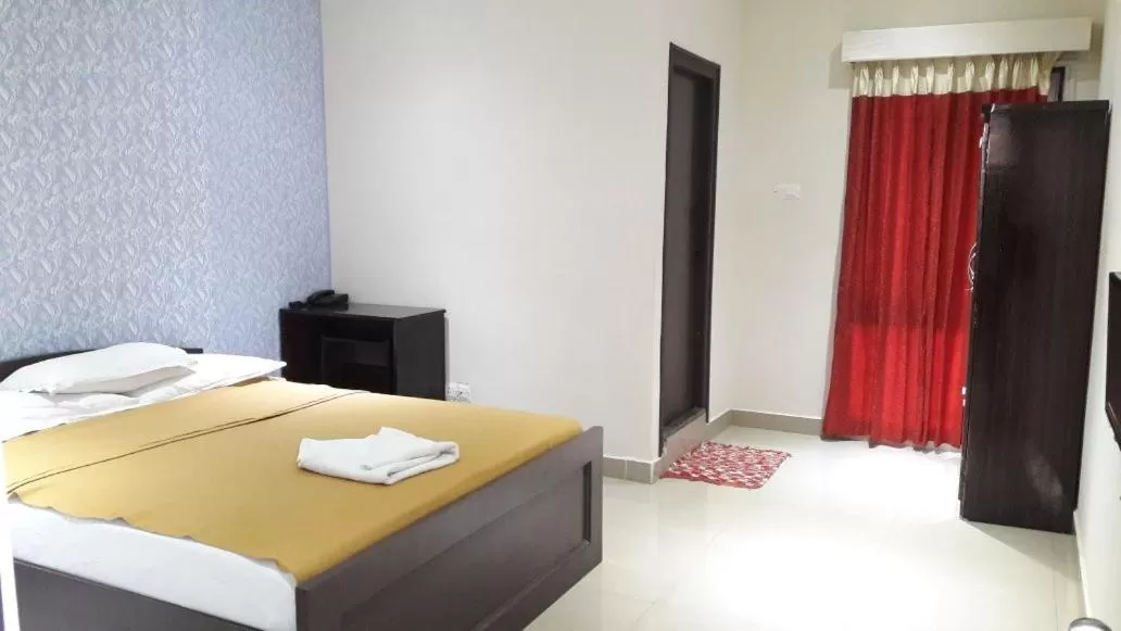 Bed in Star MSR Residency