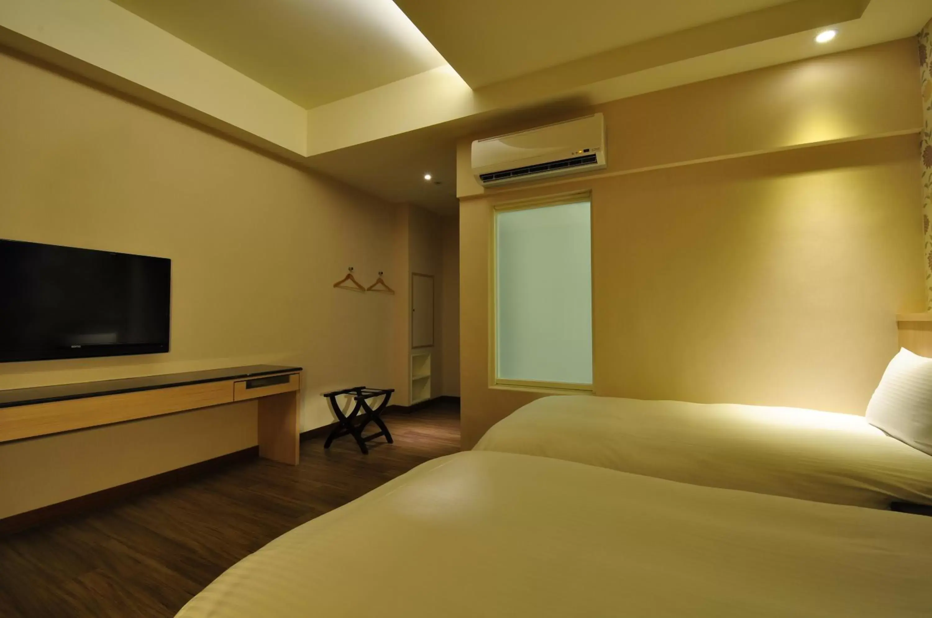 Bed in Fupin Hotel