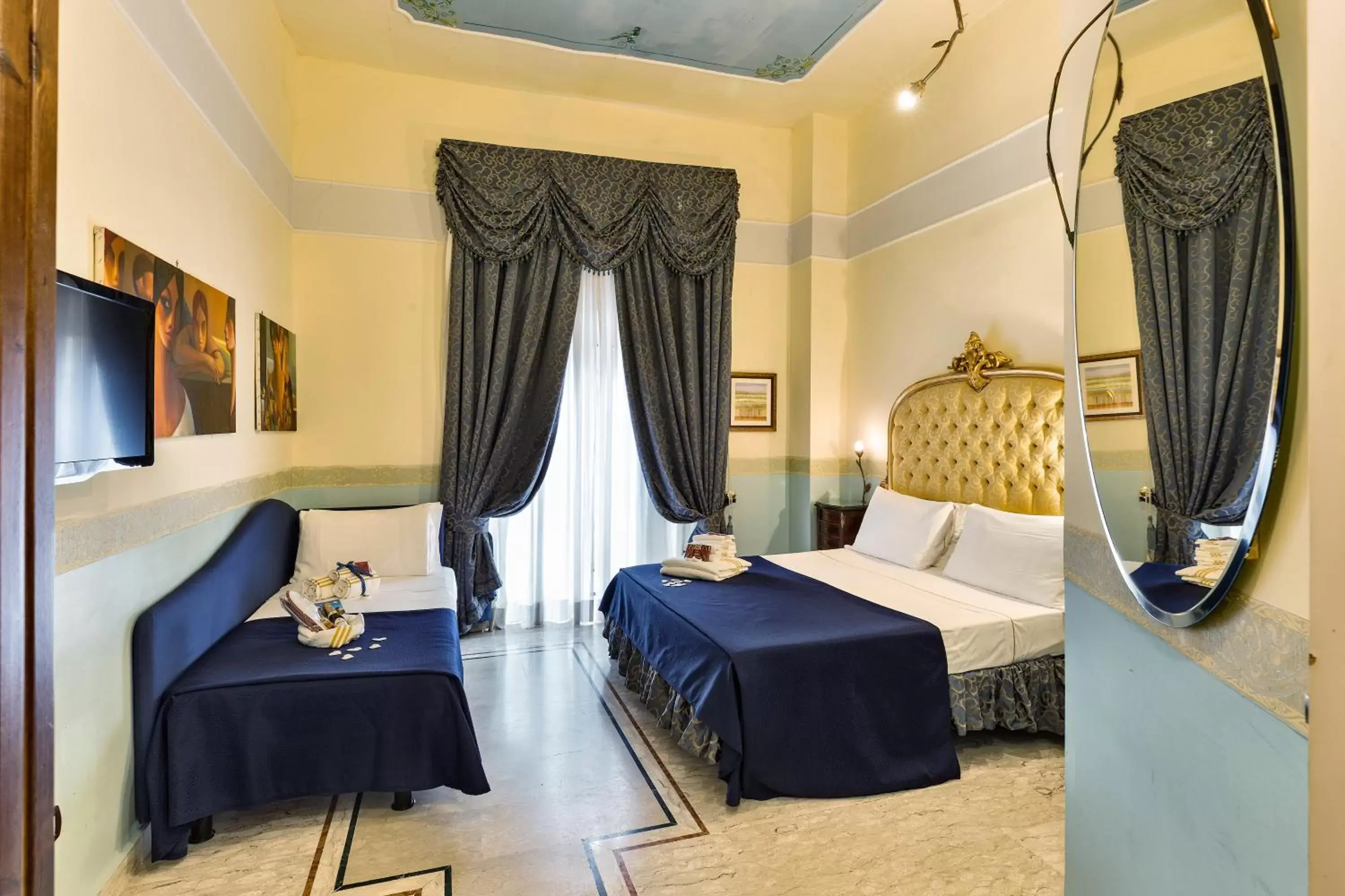 Bed in Hotel Art Resort Galleria Umberto