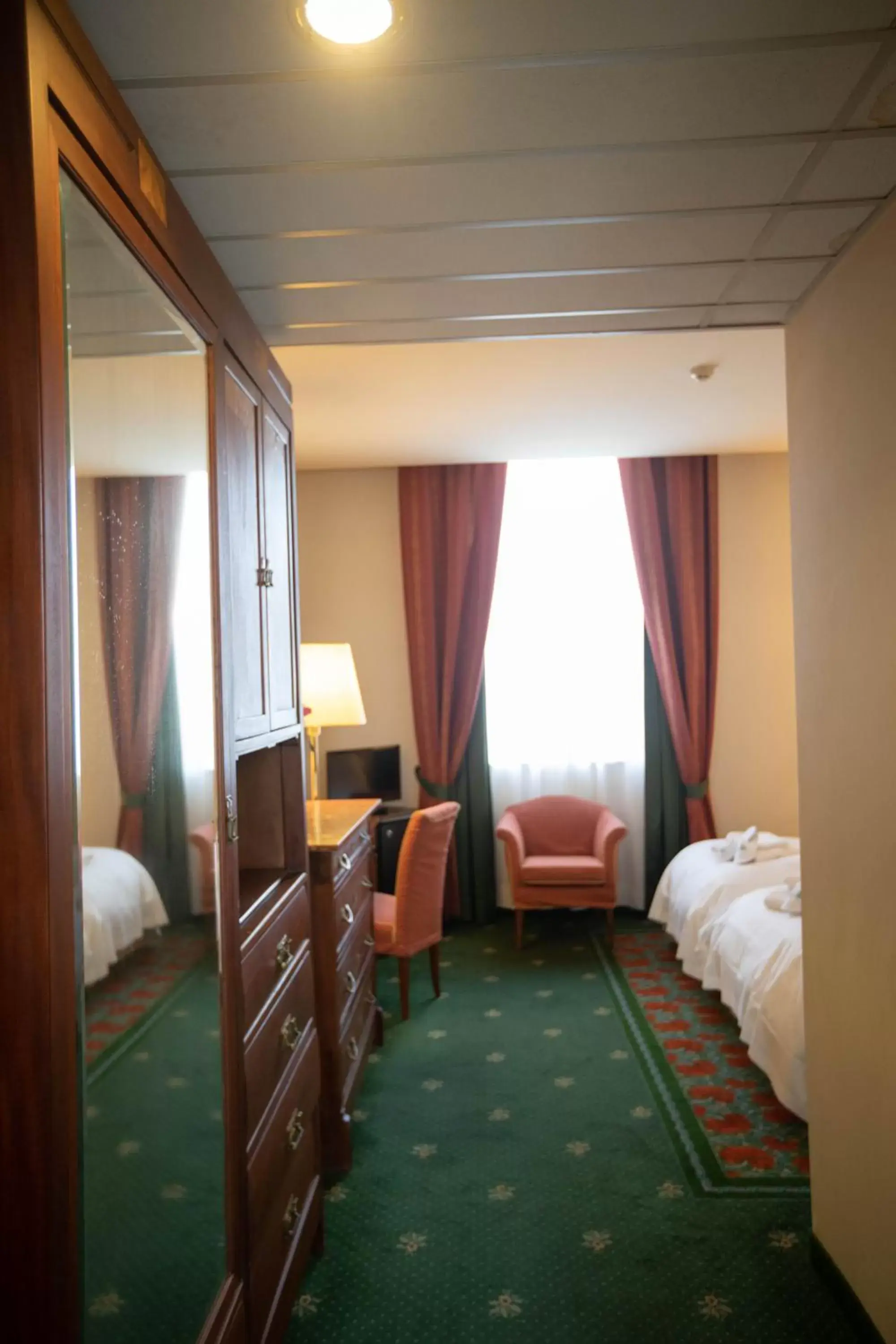 Bedroom, Seating Area in Hotel Candiani