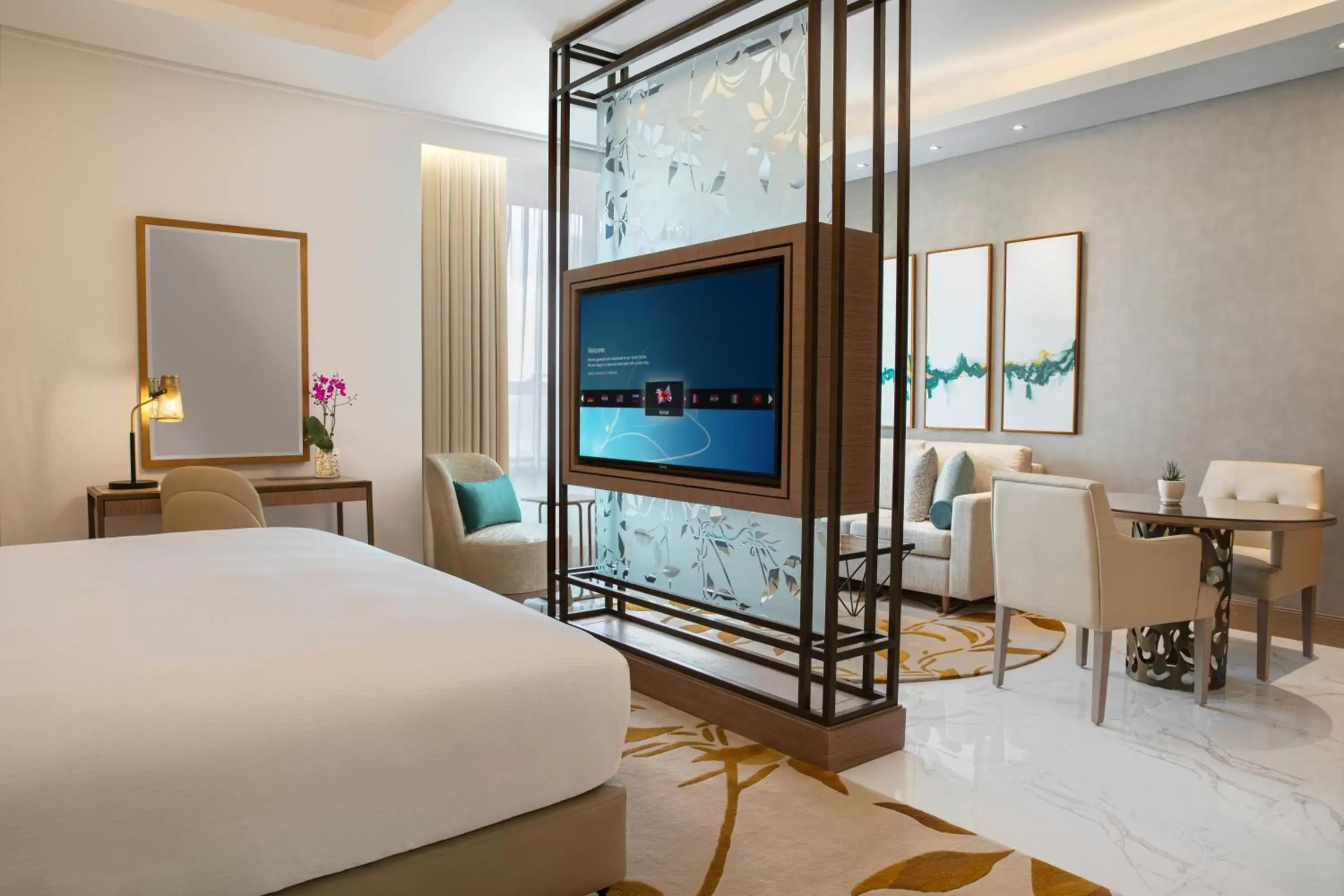 Bed, TV/Entertainment Center in Al Jaddaf Rotana Suite Hotel