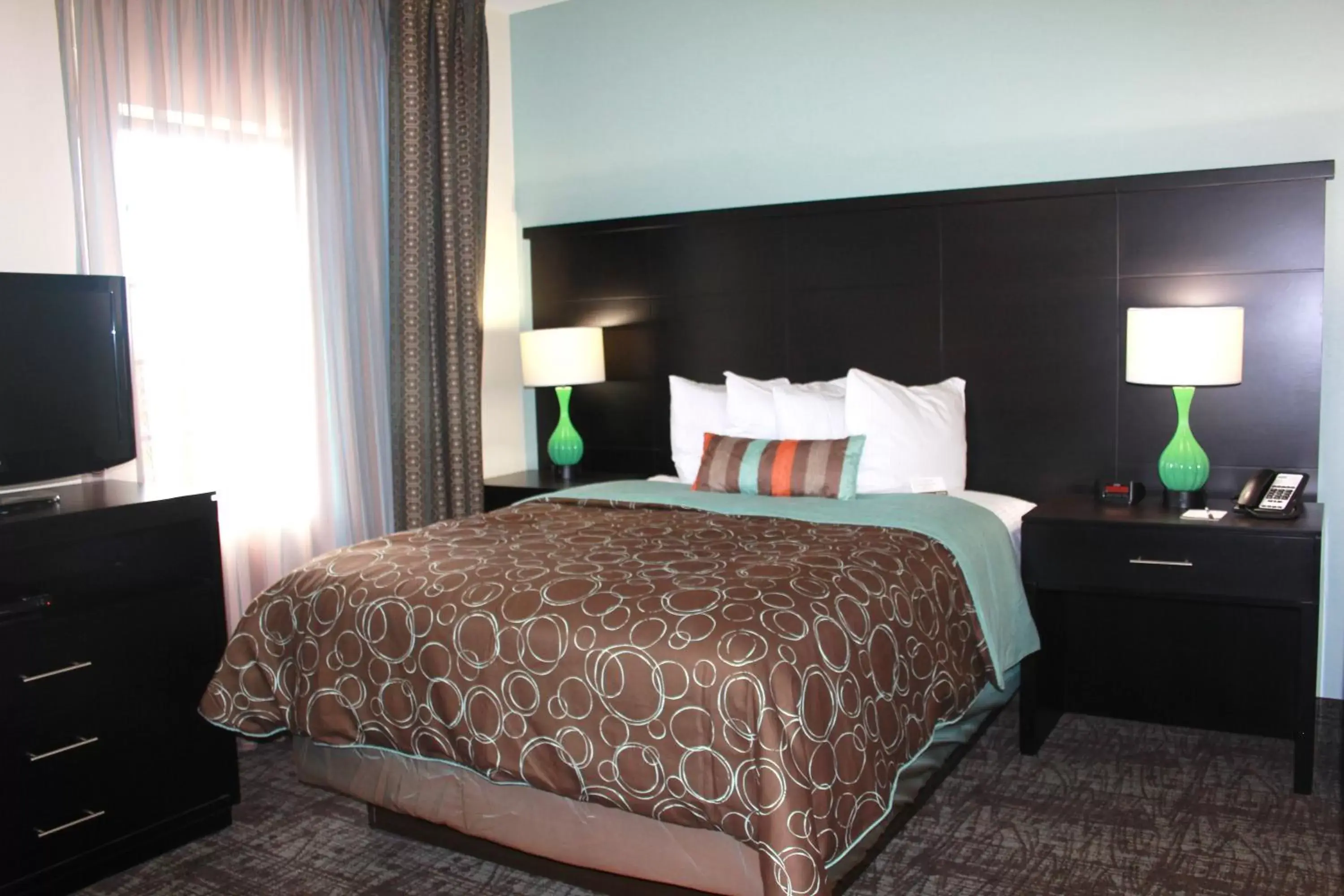 Bed in Staybridge Suites Houston - IAH Airport, an IHG Hotel
