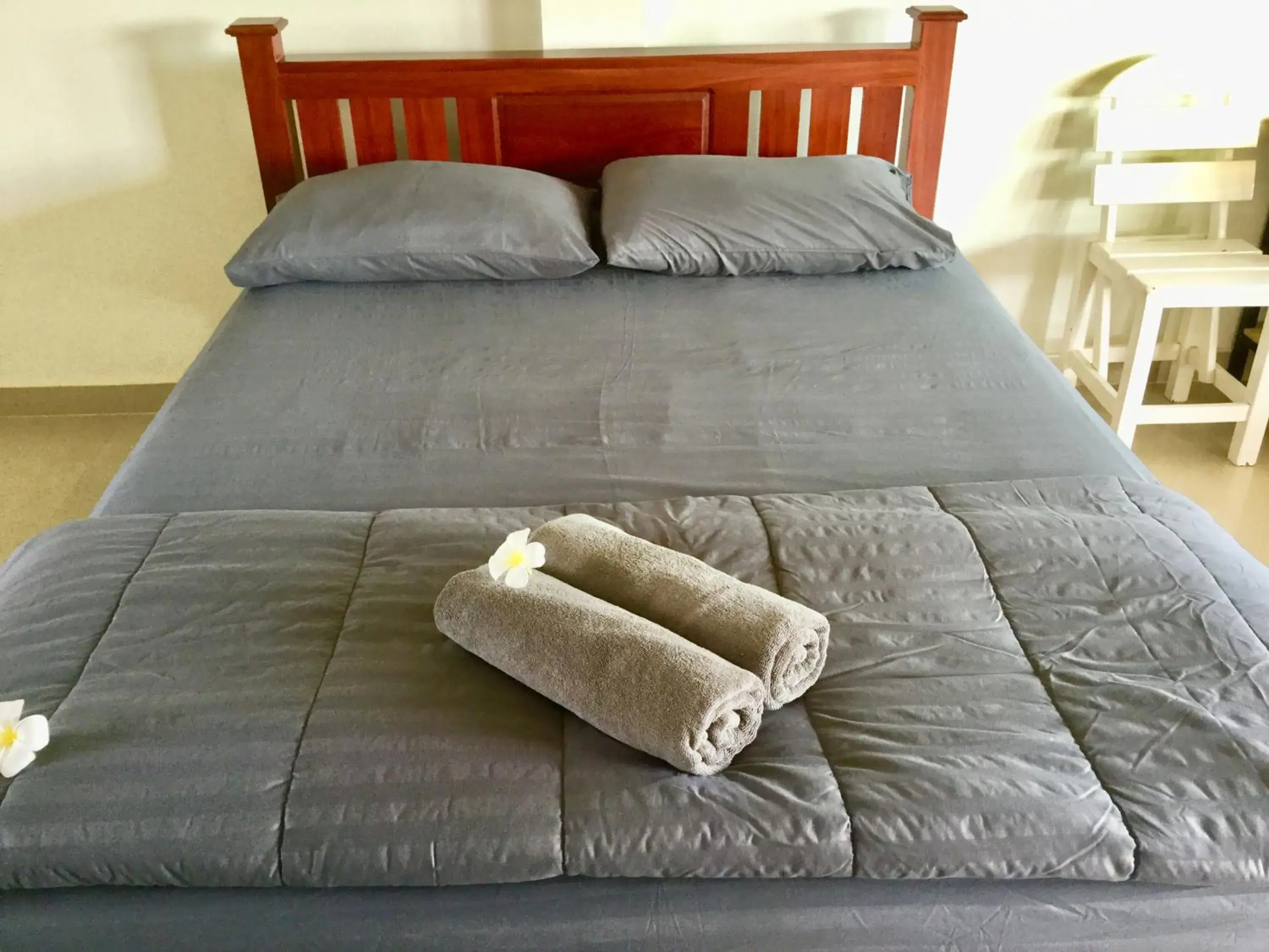 Bed in Thai Guesthouse Bed in Thai Guesthouse