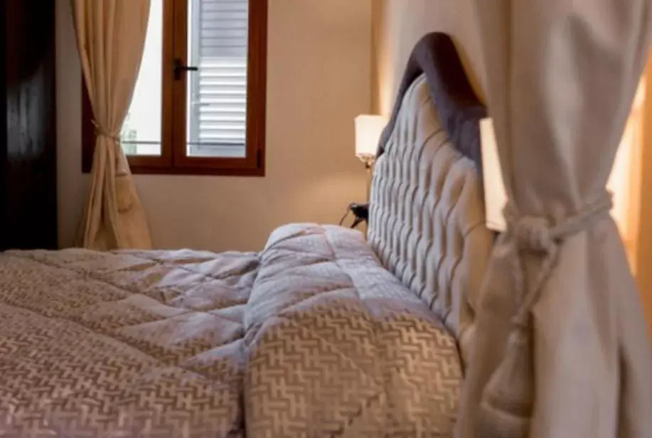 Bed in Borgo Pinti Suites Le Stanze dei Nobili