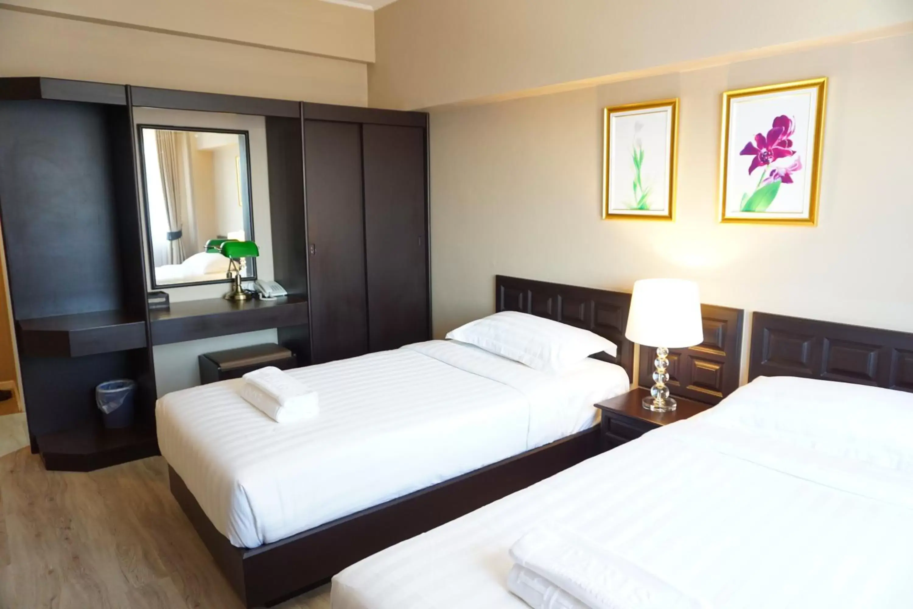 Bed in Taris Art Hotel Phrae