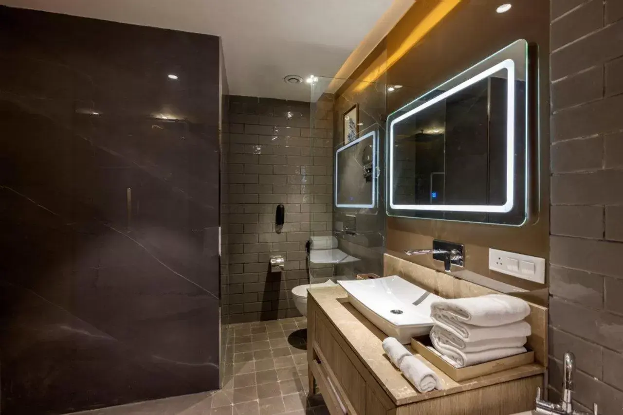 Shower, Bathroom in Sarovar Portico Morbi