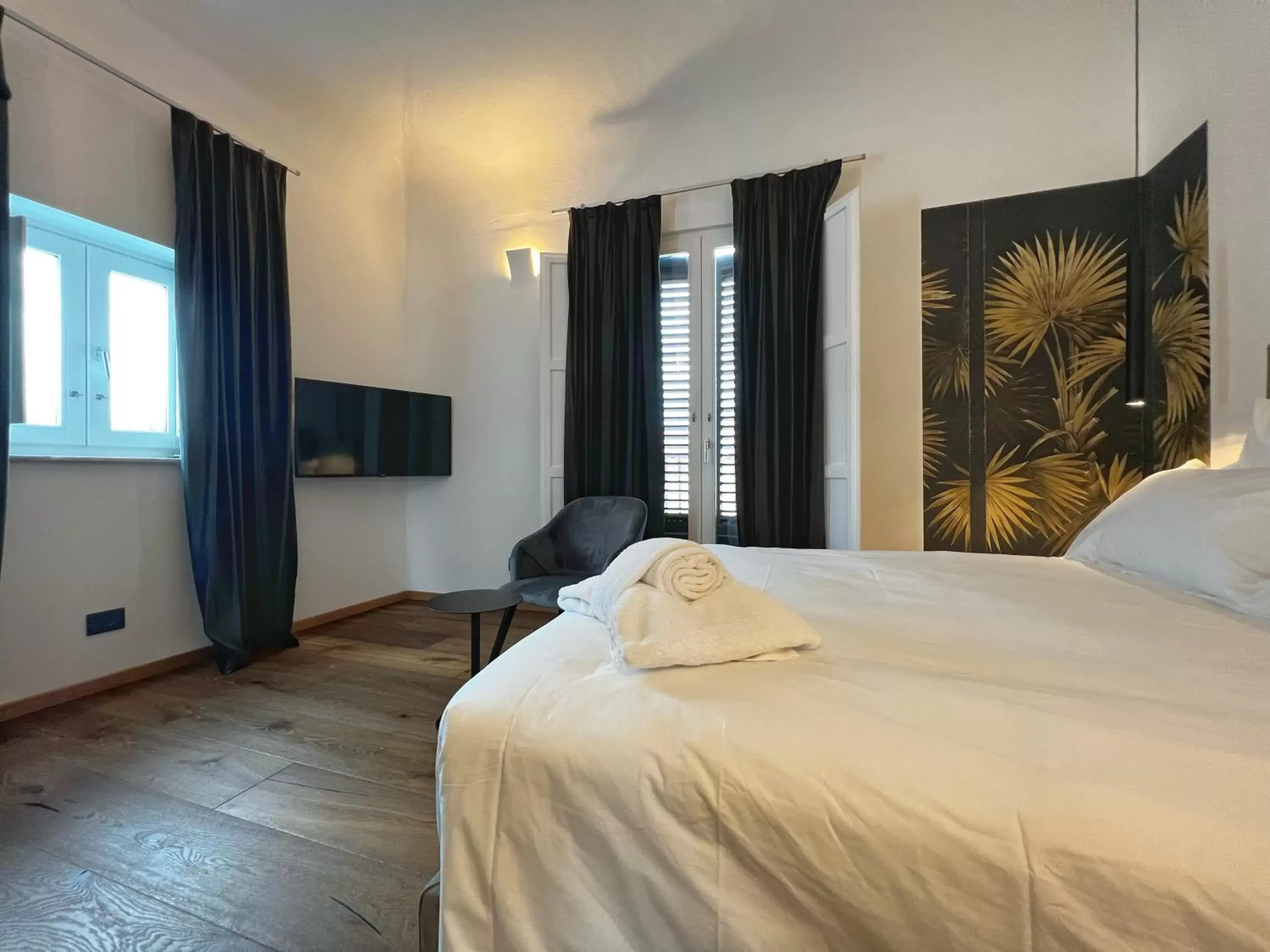 Bed in Gioiamia - Luxury Rooms in Cattedrale