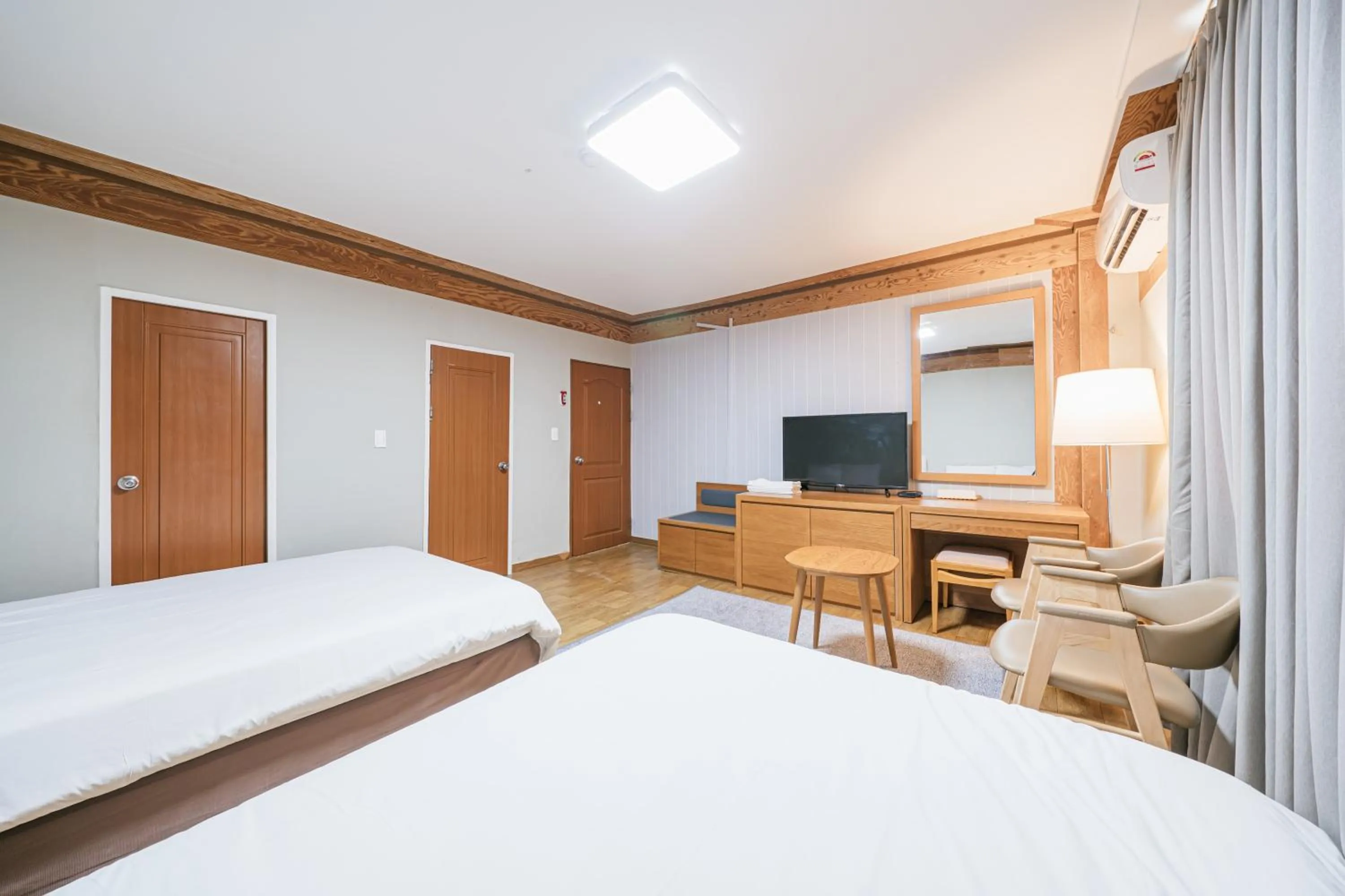 Bed in Jeju Miracle Hotel