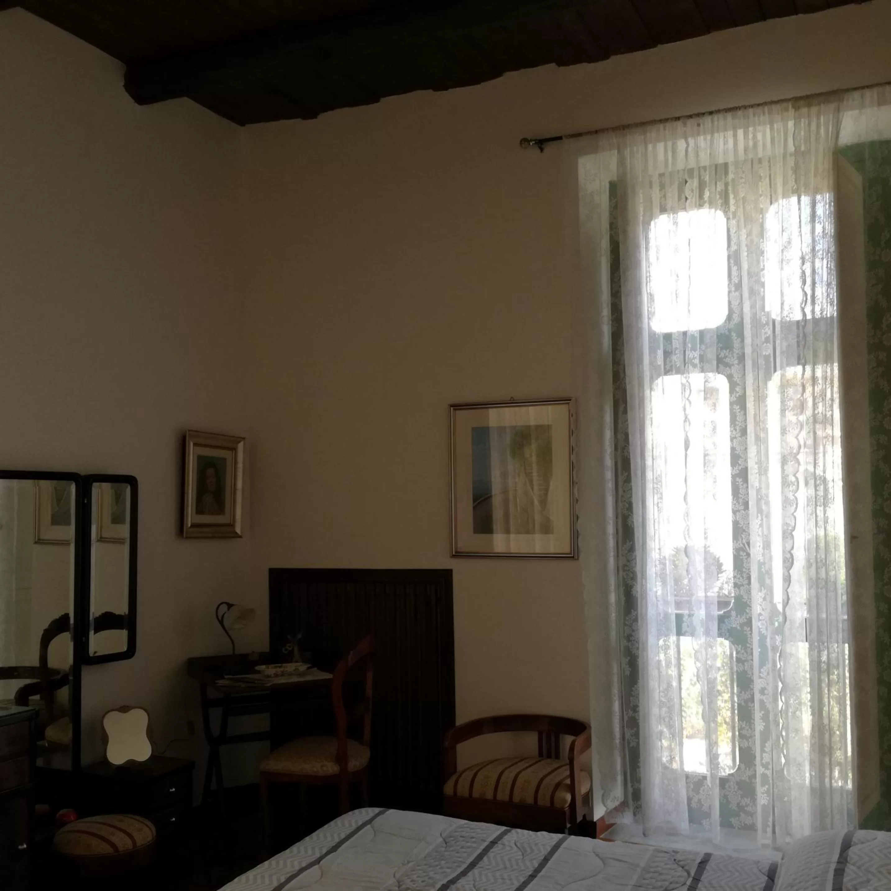 Photo of the whole room, Bed in In Via Roma