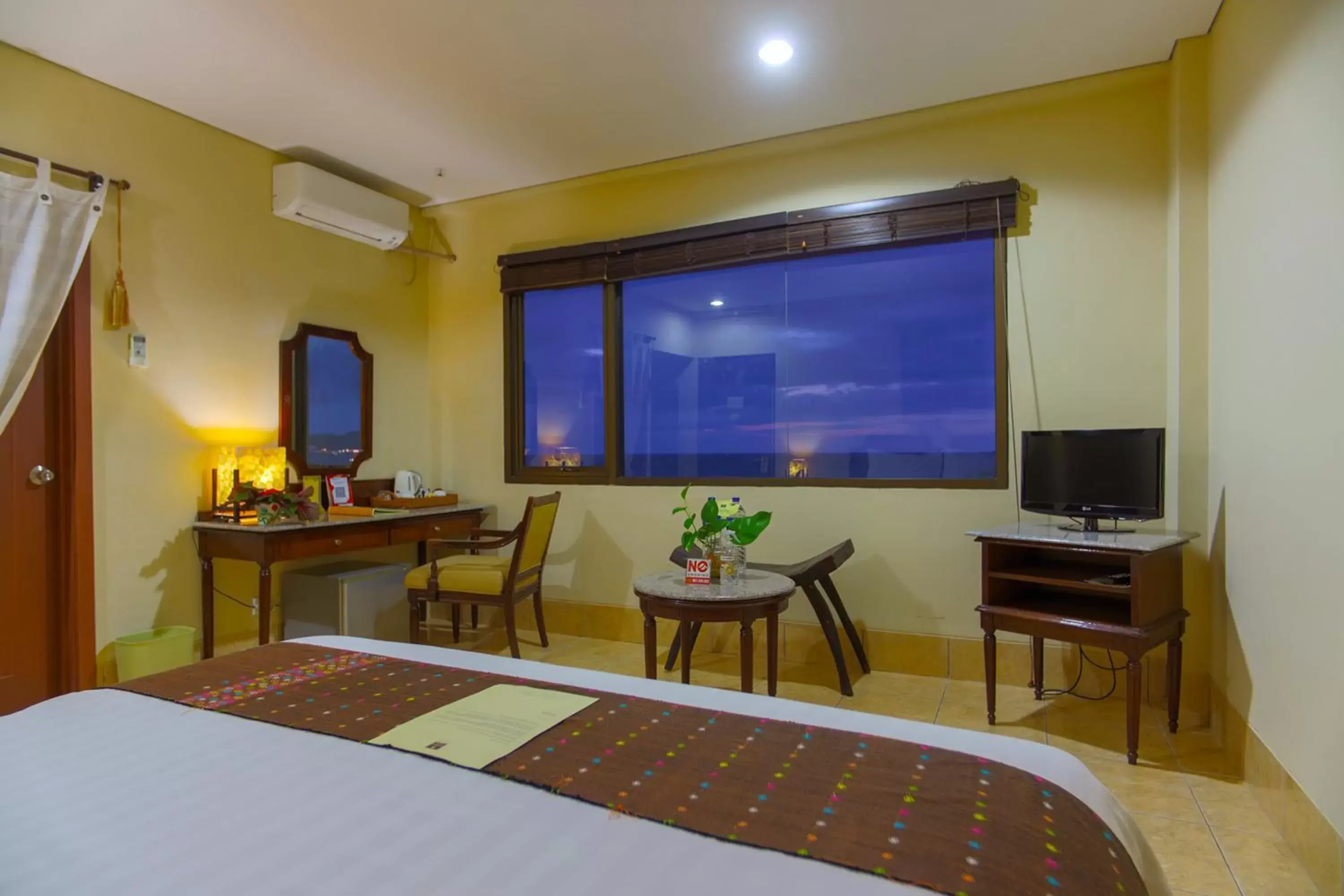 Bedroom, TV/Entertainment Center in The Jayakarta Suites Komodo Flores