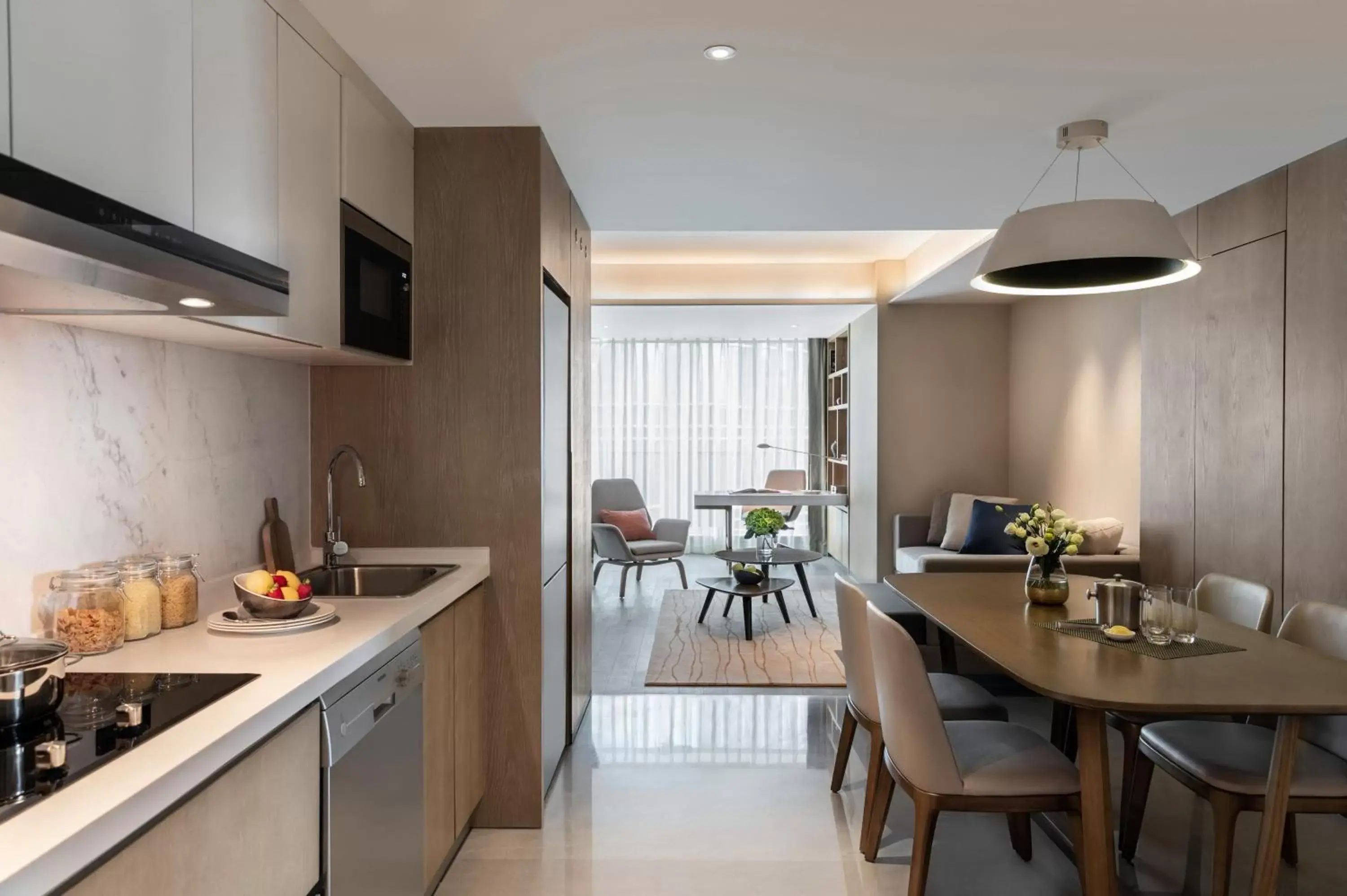 Living room, Kitchen/Kitchenette in Marriott Executive Apartments Chongqing