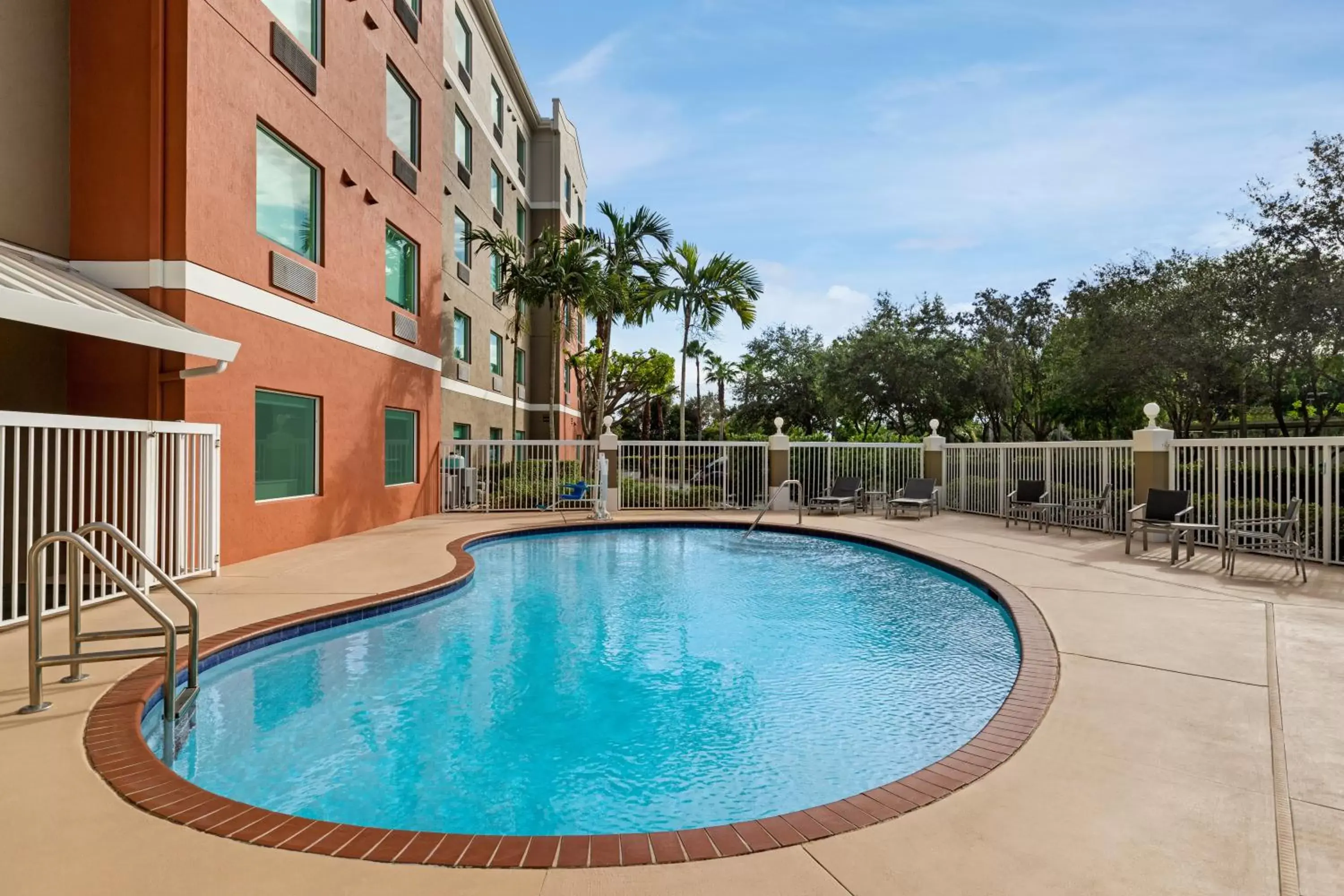 Swimming Pool in Holiday Inn Express & Suites Pembroke Pines-Sheridan St, an IHG Hotel