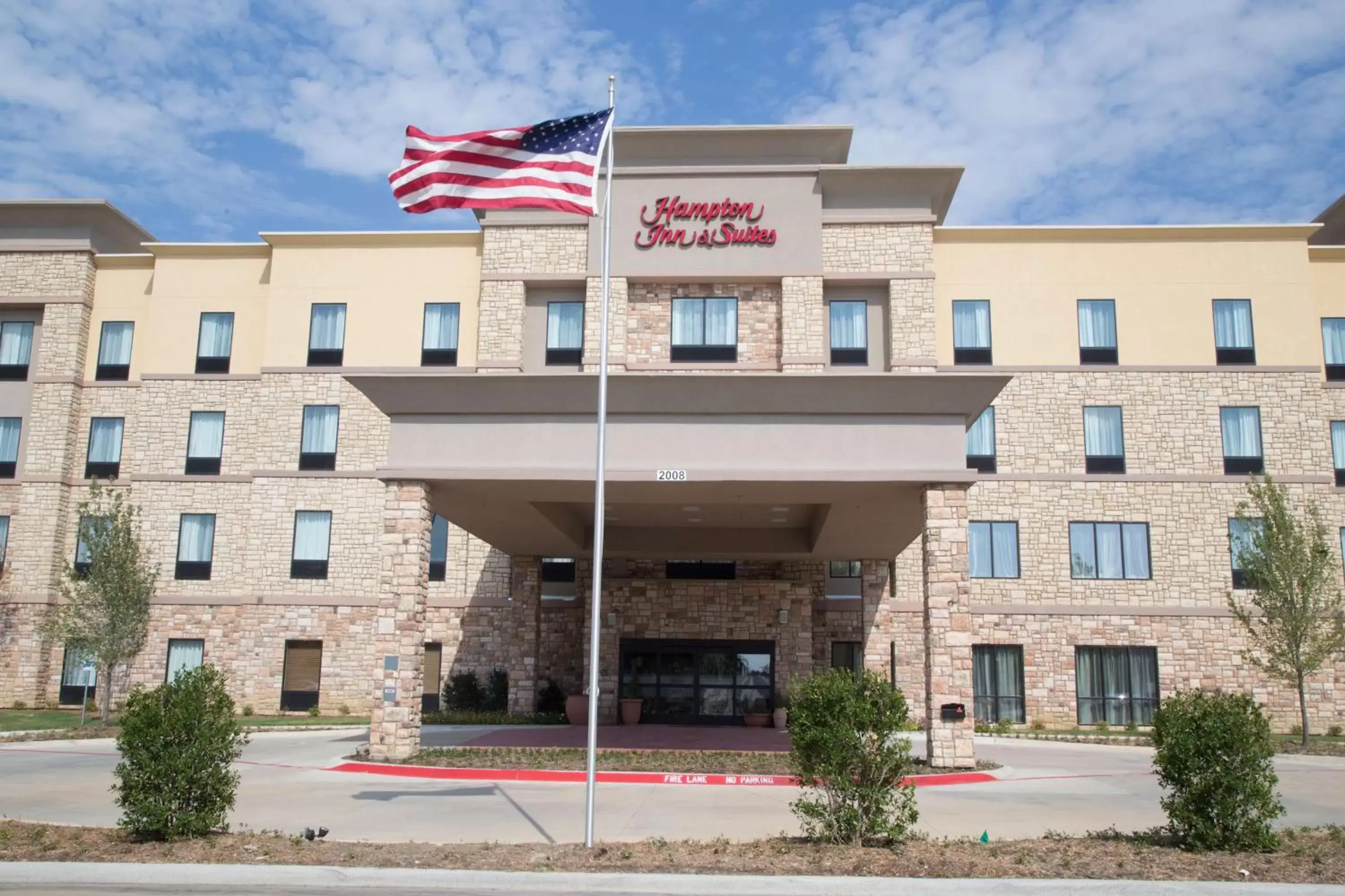 Property Building in Hampton Inn and Suites by Hilton McKinney