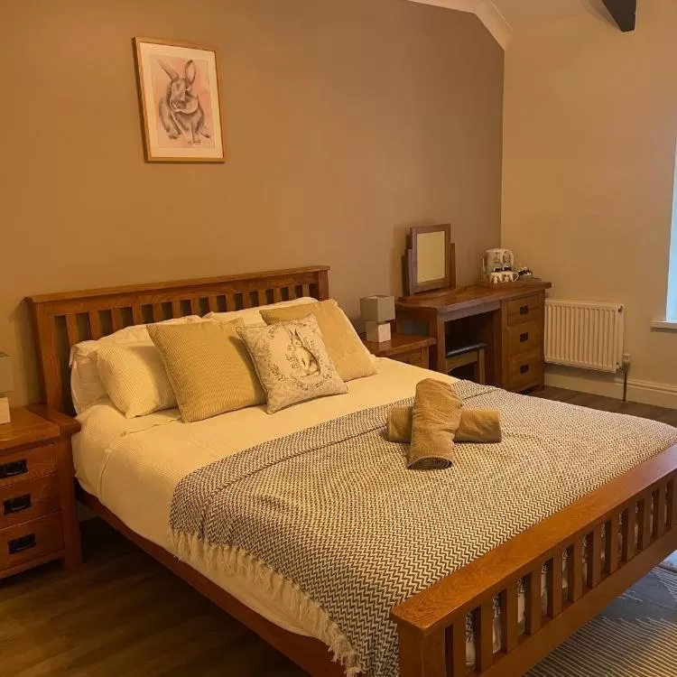 Bed in The Cottage Inn