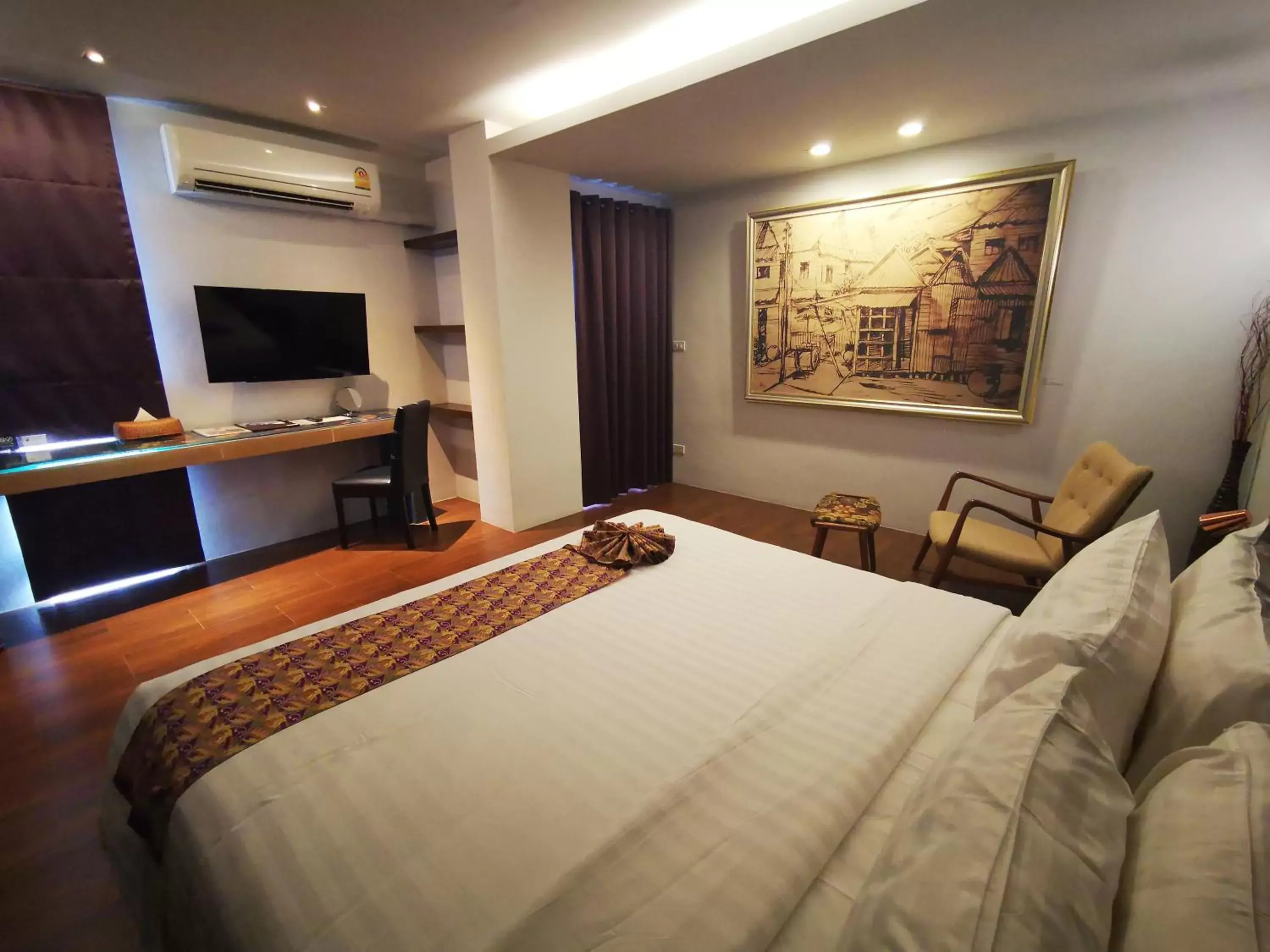 TV and multimedia, Bed in Mandy Nok Hotel