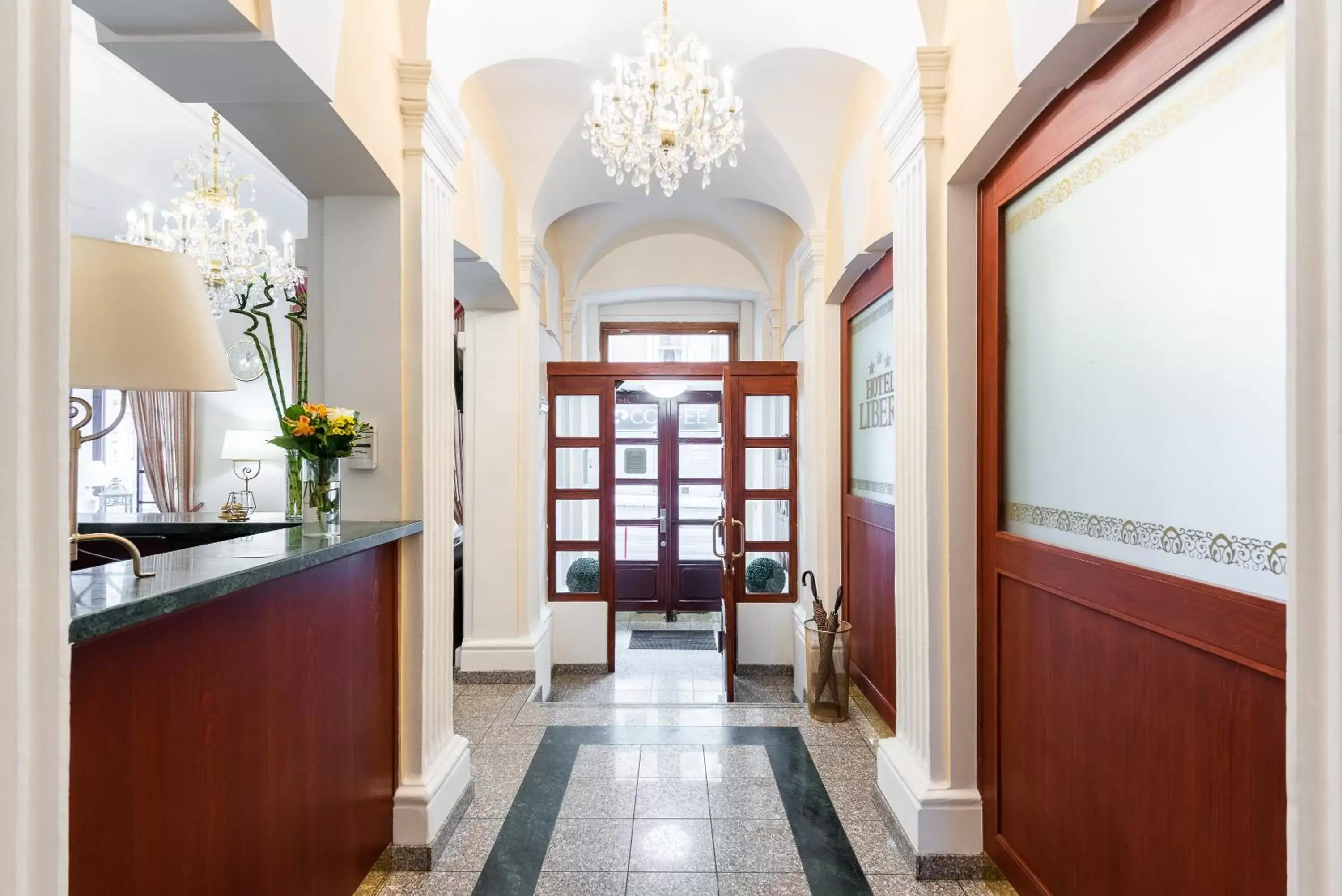 Lobby or reception in Hotel Libero Lobby or reception in Hotel Libero