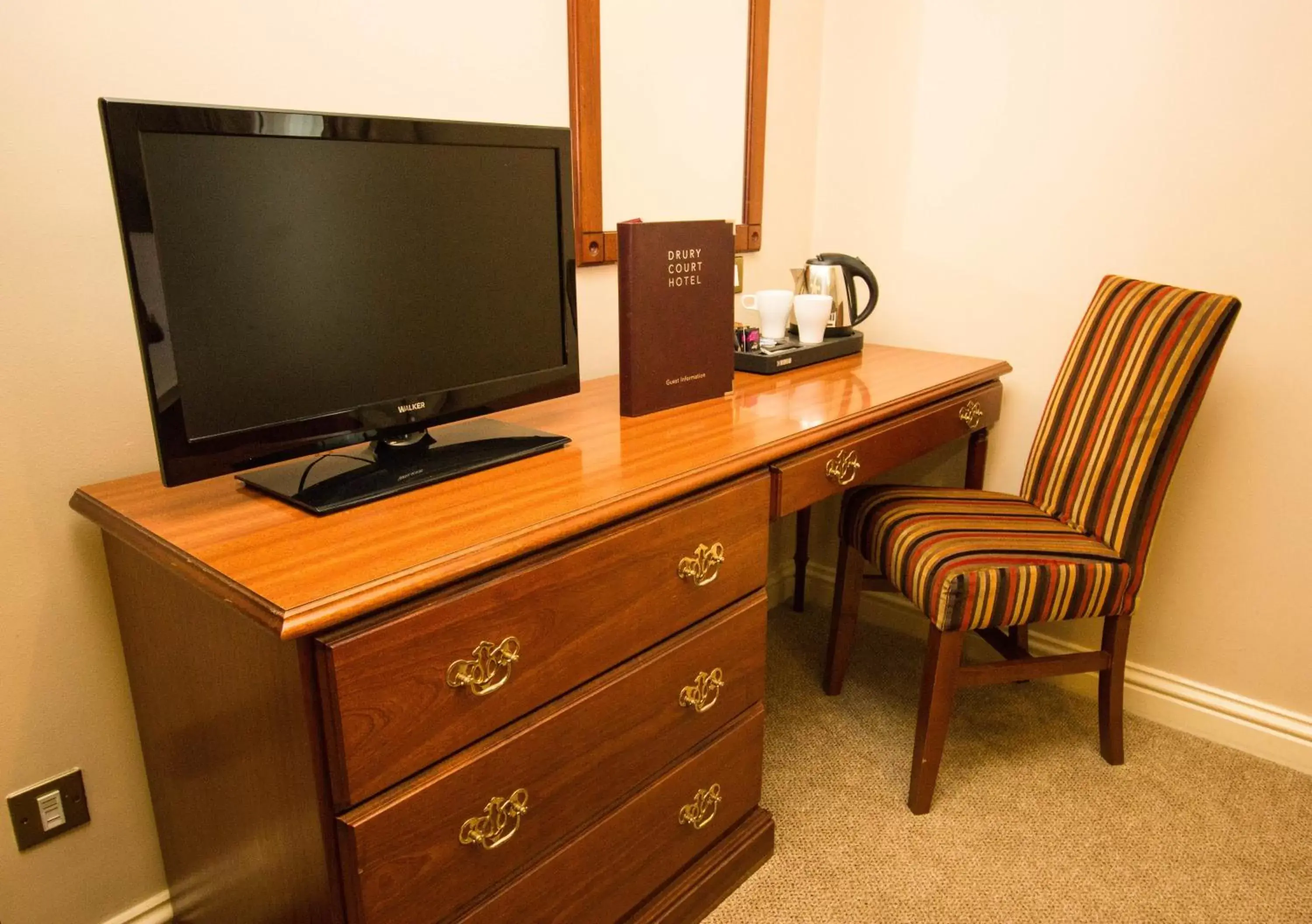 TV and multimedia, TV/Entertainment Center in Drury Court Hotel