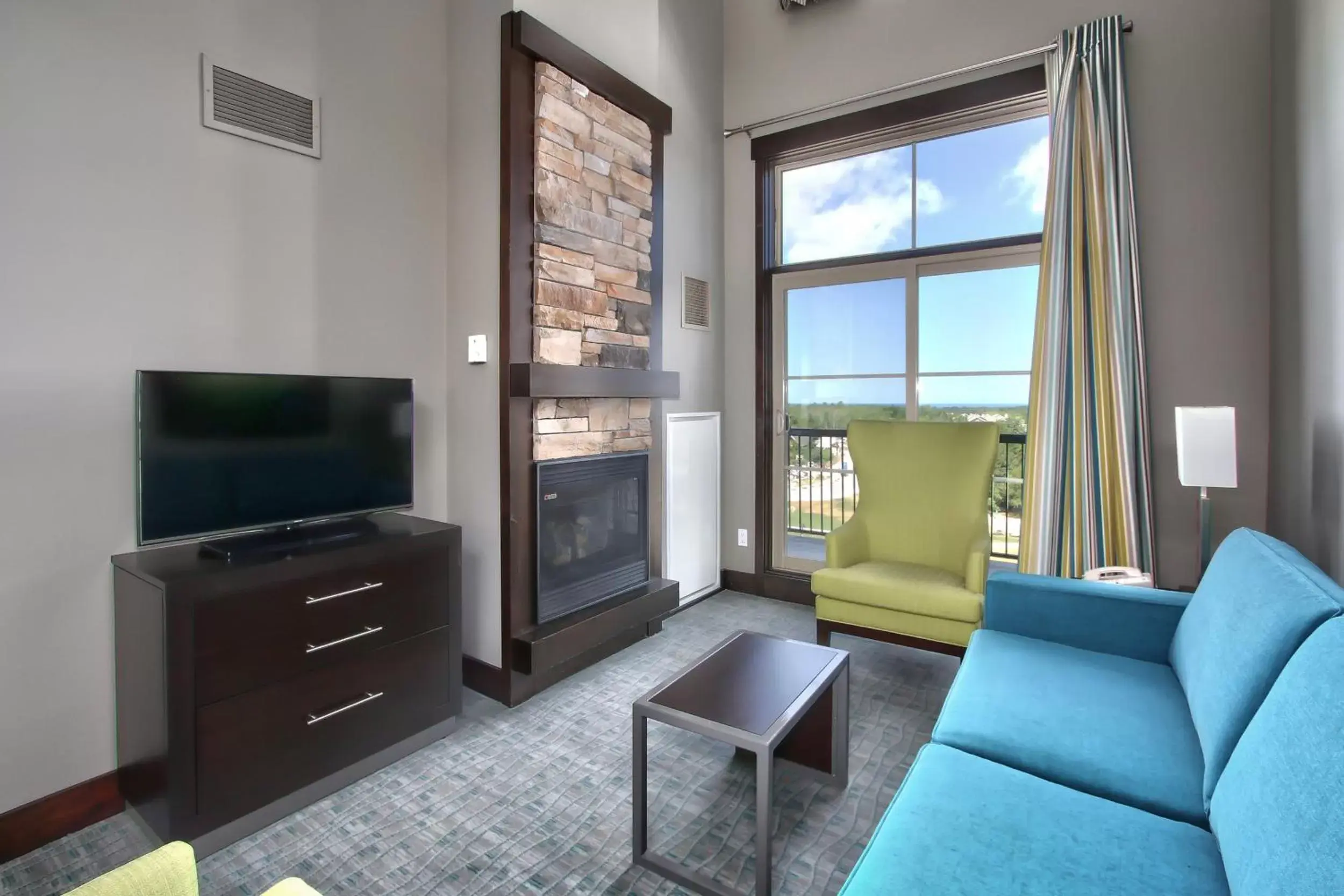 Living room, TV/Entertainment Center in Blue Mountain Resort Mosaic Suites