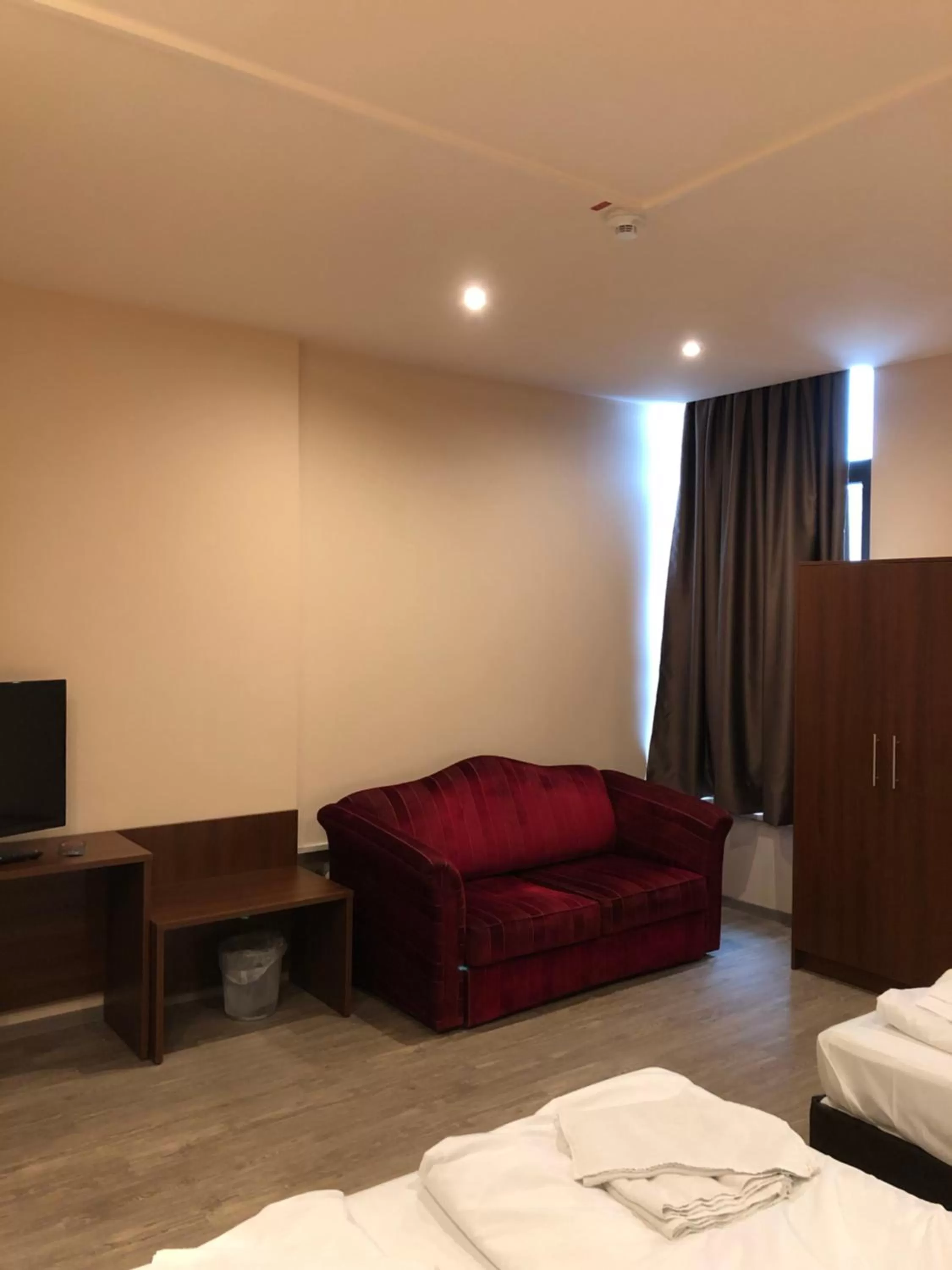 Bed in Hotel Poseidon