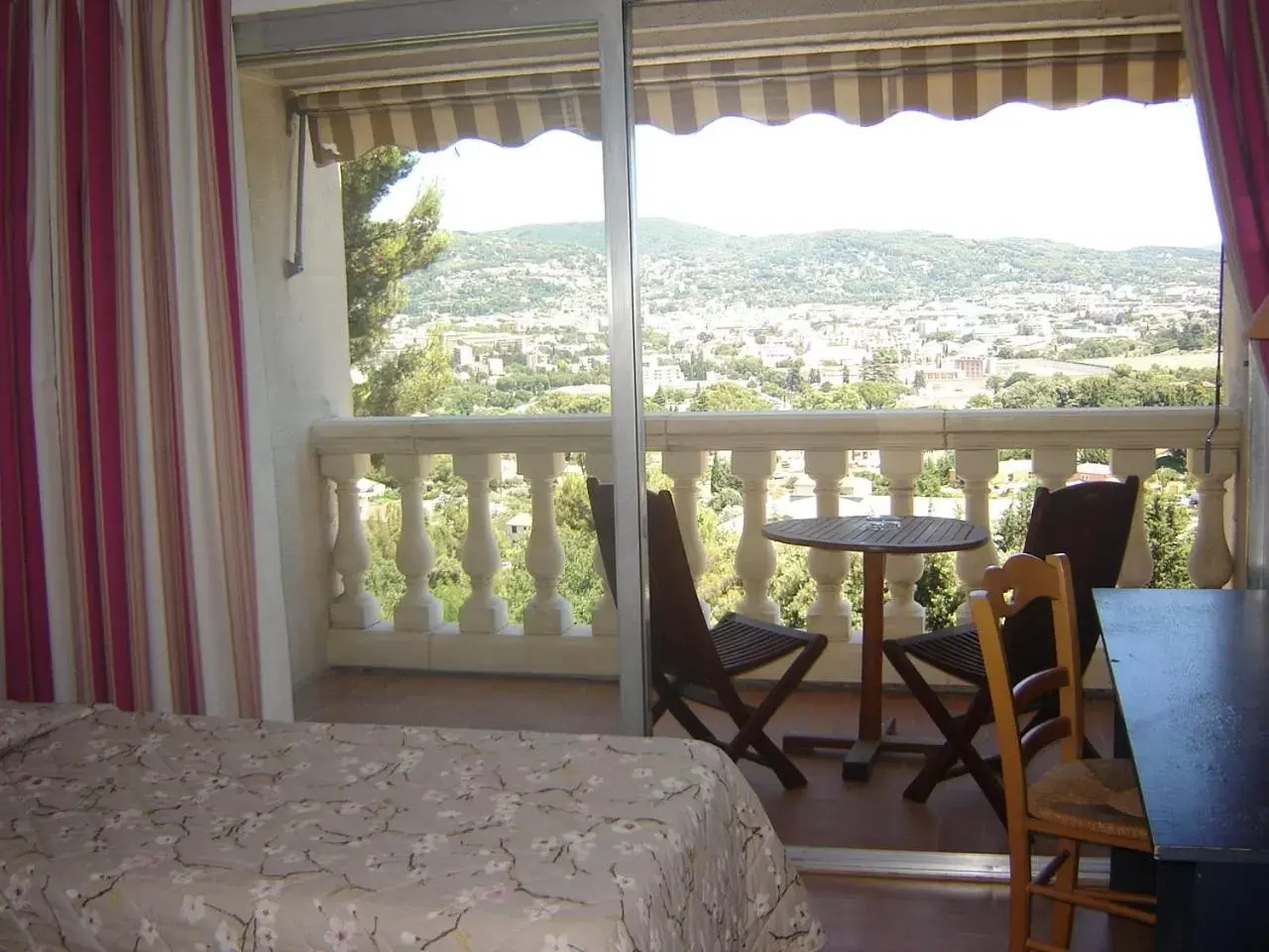 Bedroom in Logis Hotel Le Col De L'ange