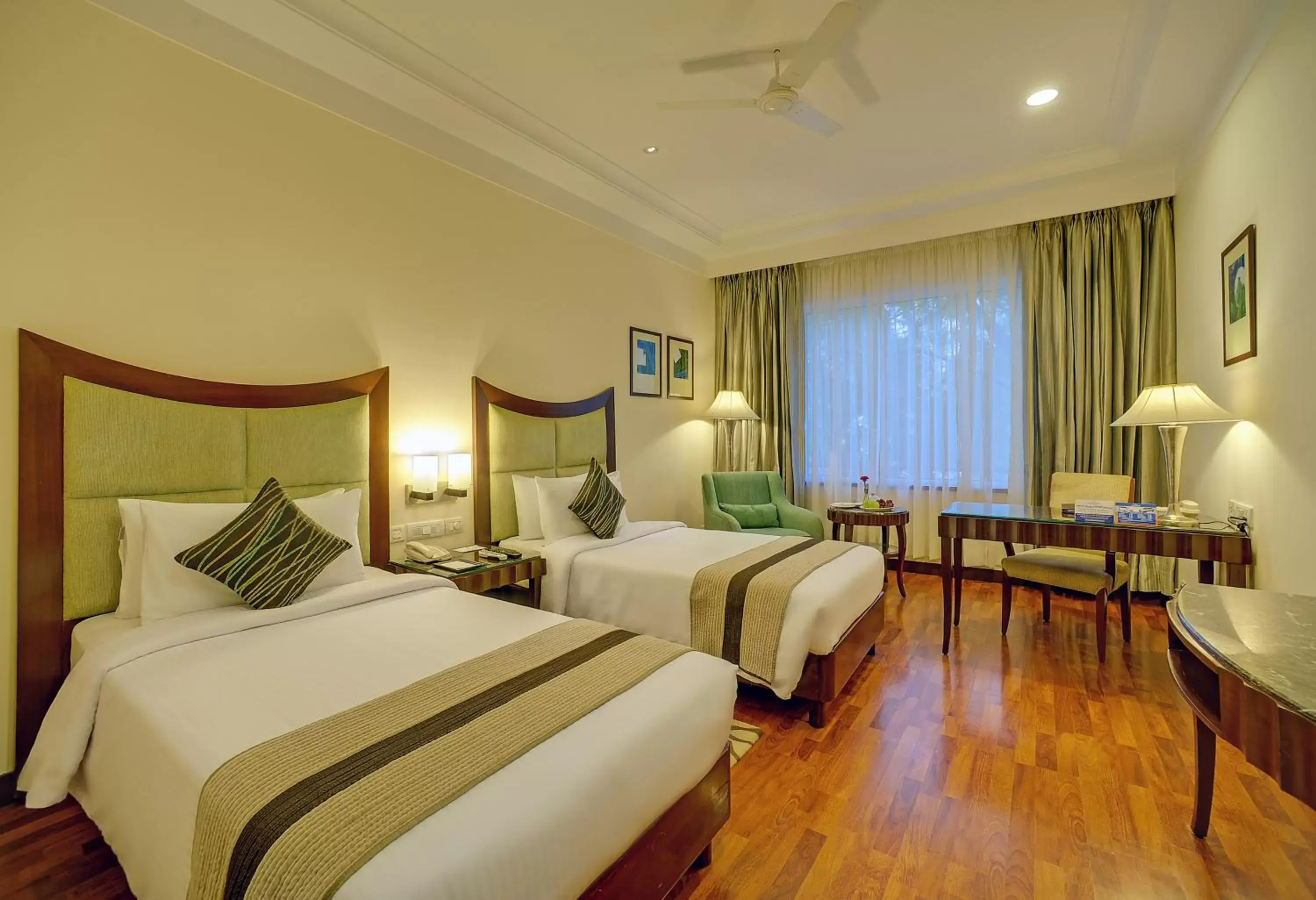Bedroom in Muse Sarovar Portico Nehru Place