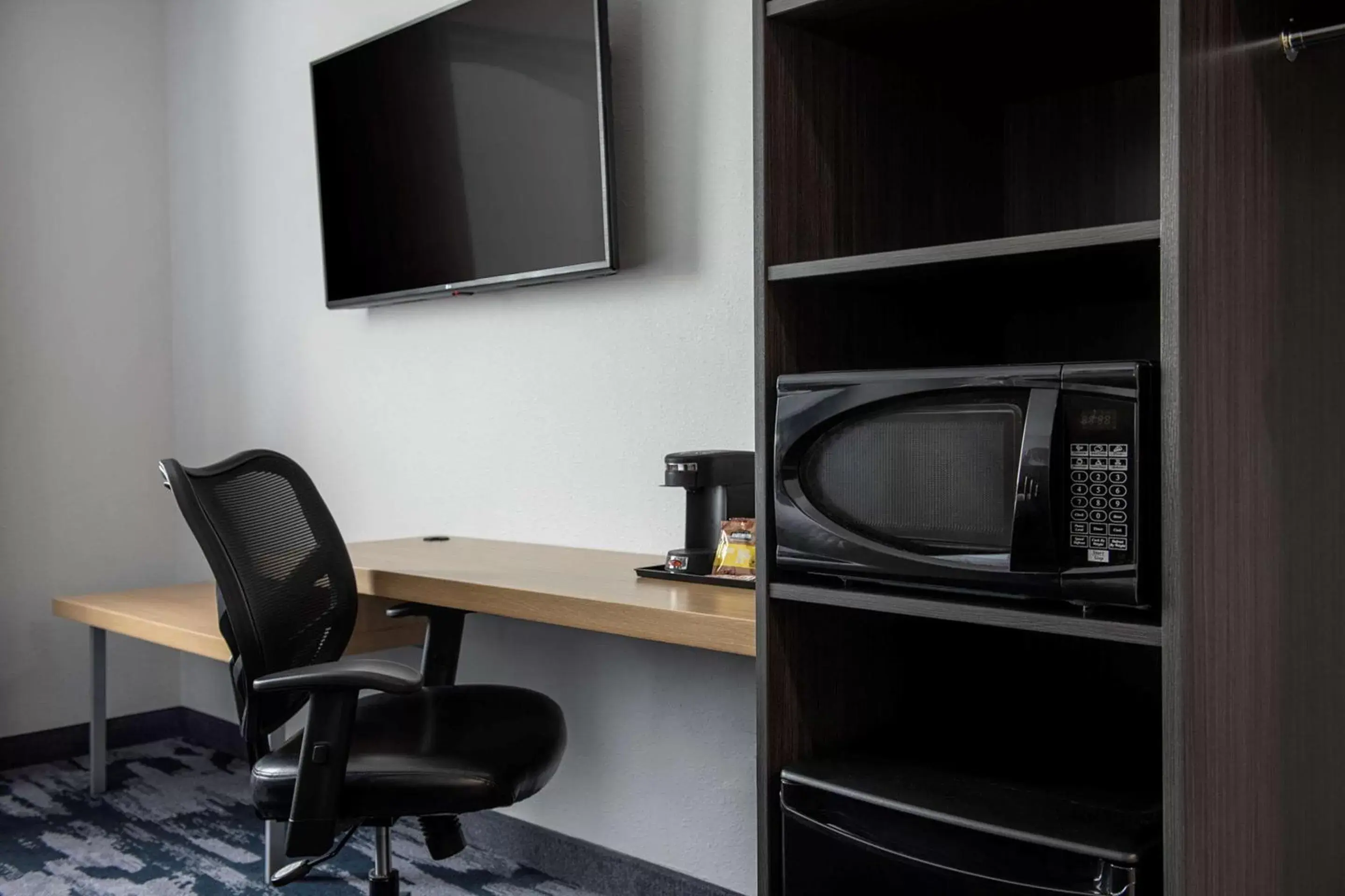 Photo of the whole room, TV/Entertainment Center in Quality Inn & Suites Winnipeg