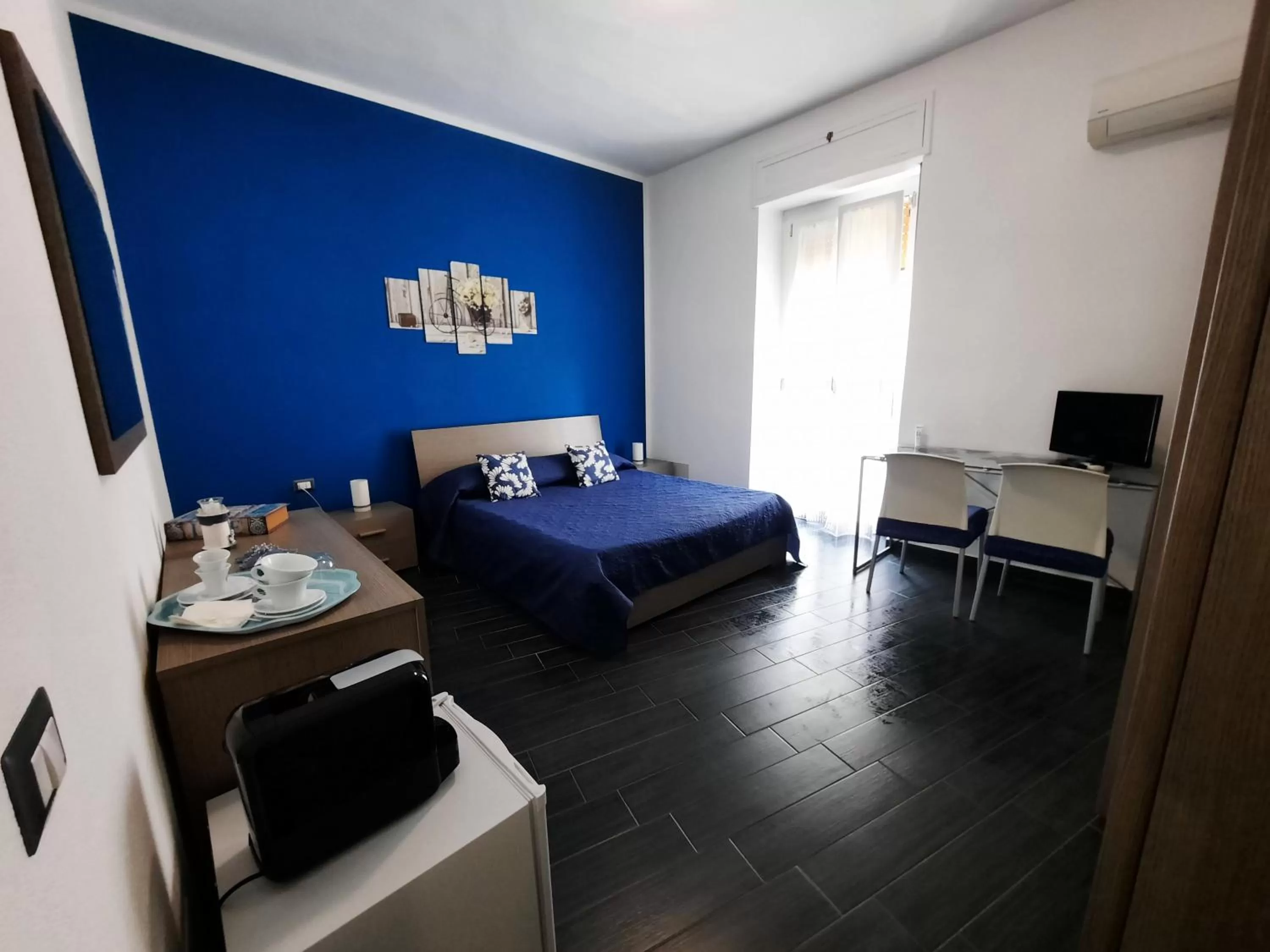 Photo of the whole room in Affittacamere Sa Pardula