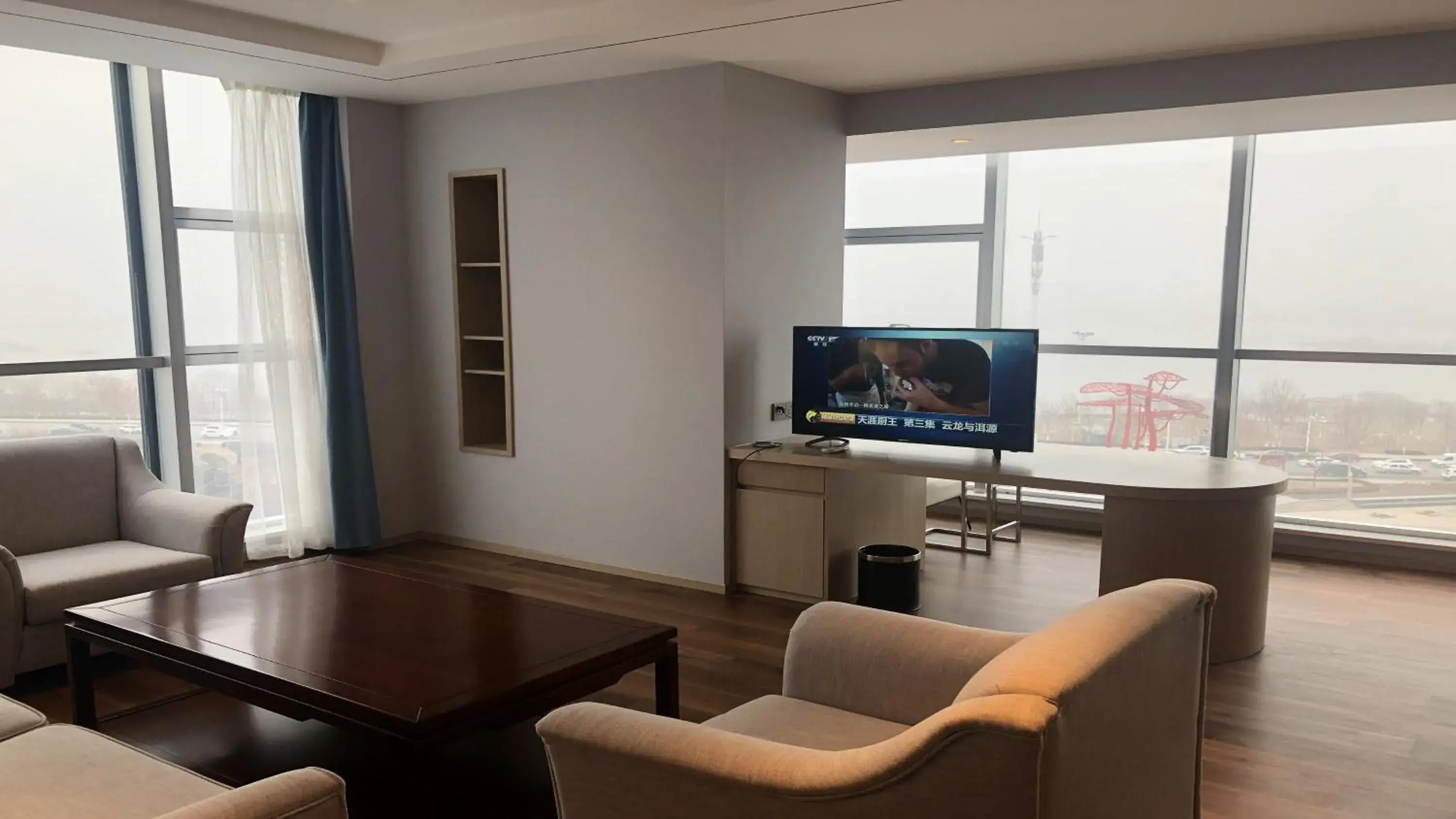 Photo of the whole room, TV/Entertainment Center in Holiday Inn Express Linyi Riverside, an IHG Hotel